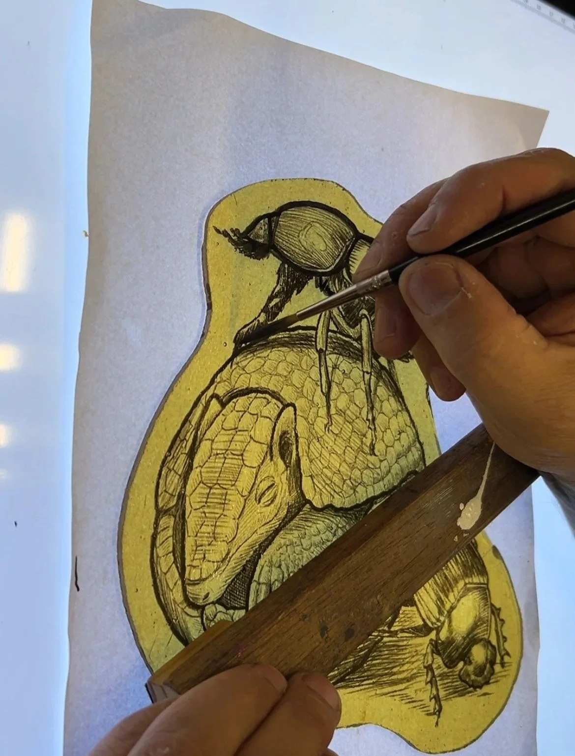 3. Tracing the original design on glass and fire the piece at 600° C