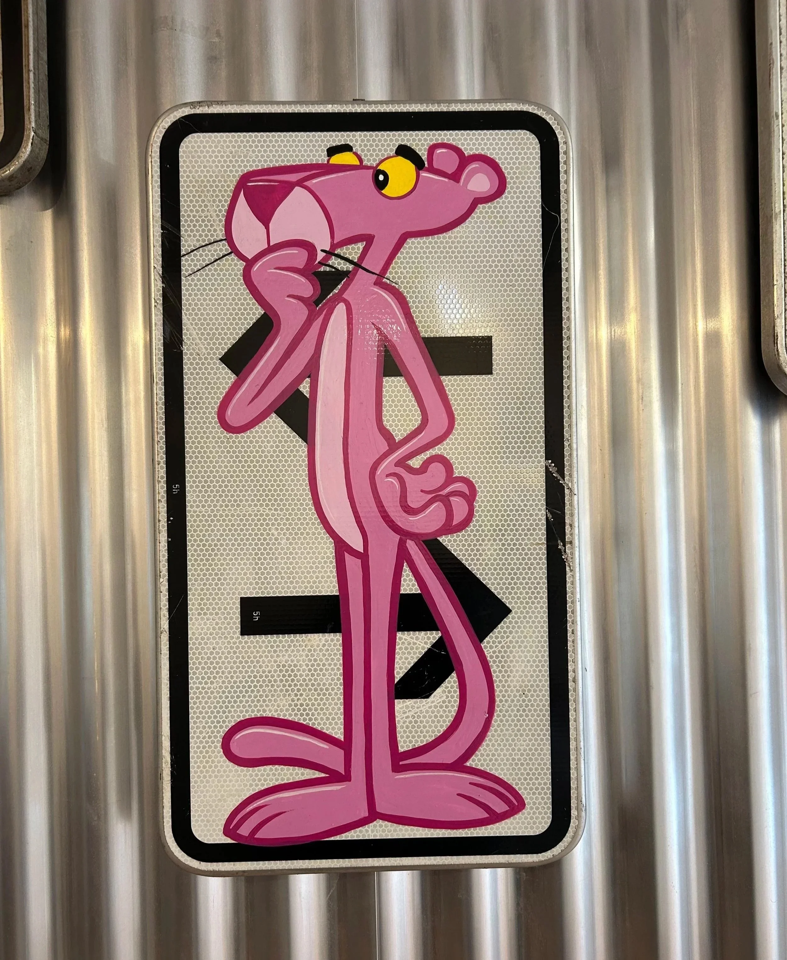 Hand painted, recycled traffic sign.