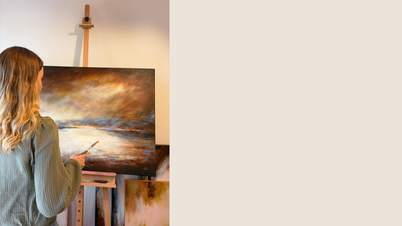 Lea Dékány painting an atmospheric acrylic landscape in her studio
