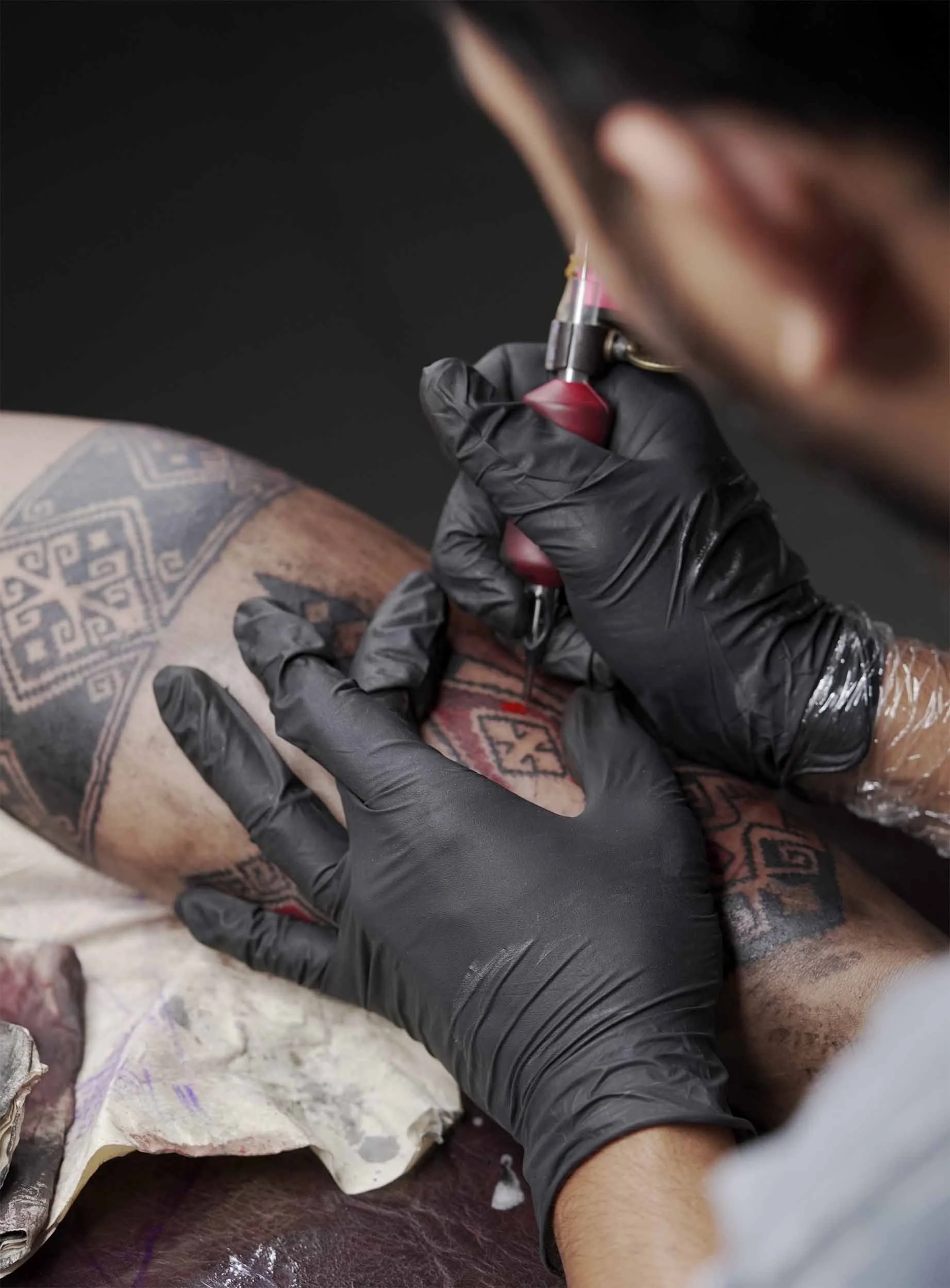 bali based tattoo artist doing ornamental tattoo