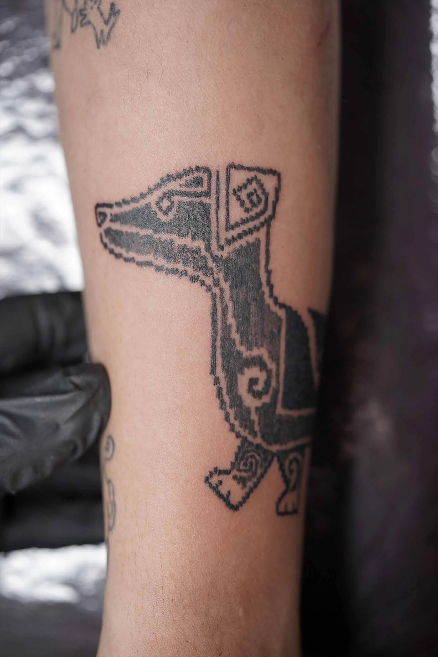 zoom view of dog head tattoo