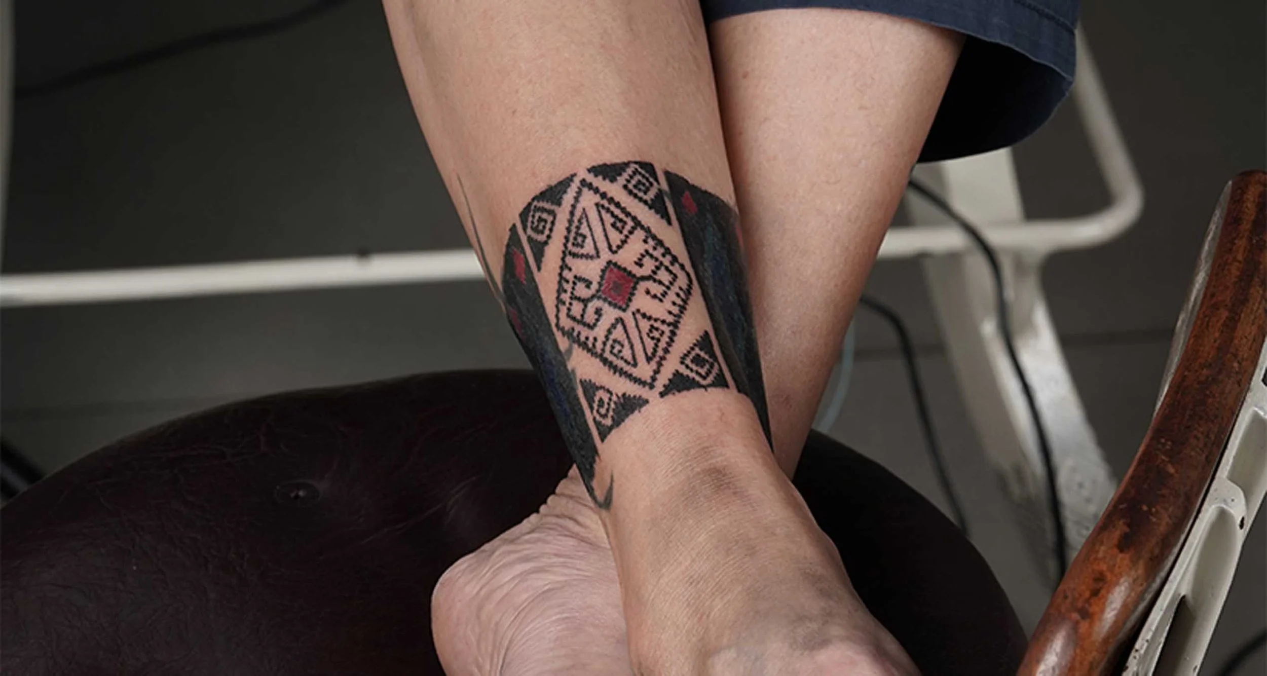 Ornamental Ankle band tattoo