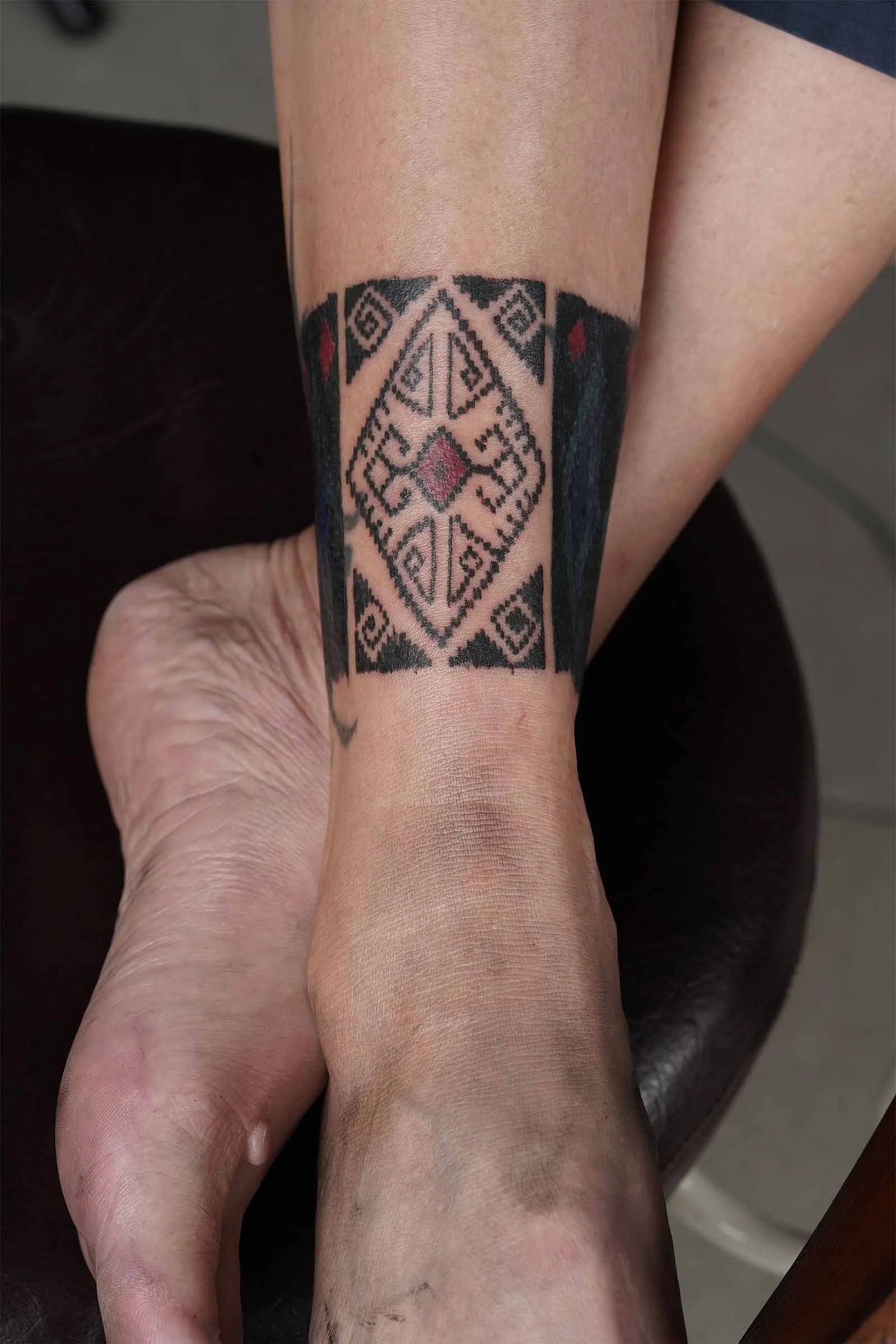 Bold Ornamental ankle Band tattoo by sukanasikucing in bali