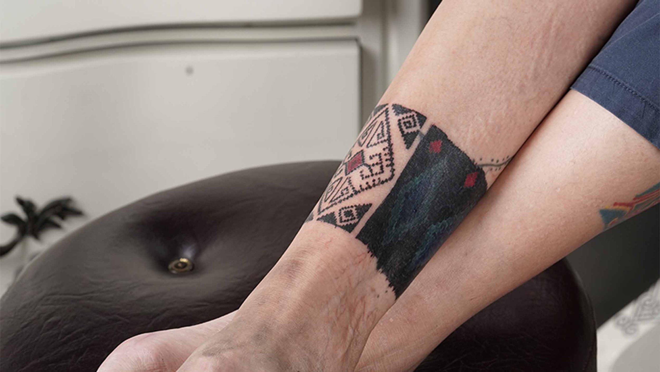 Ornamental ankle band Tattoo Bali on woman ankle