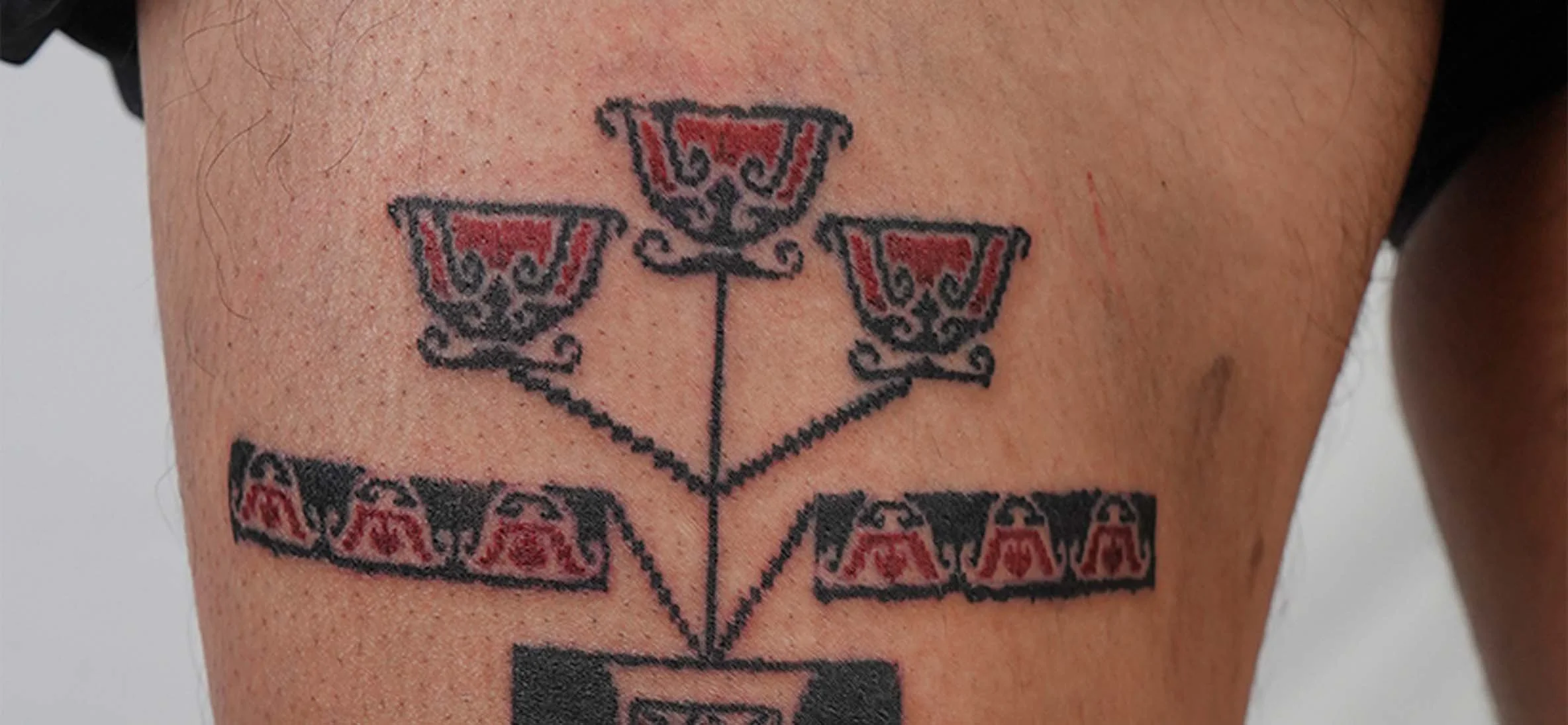 tulip tattoo with tenun pattern bali