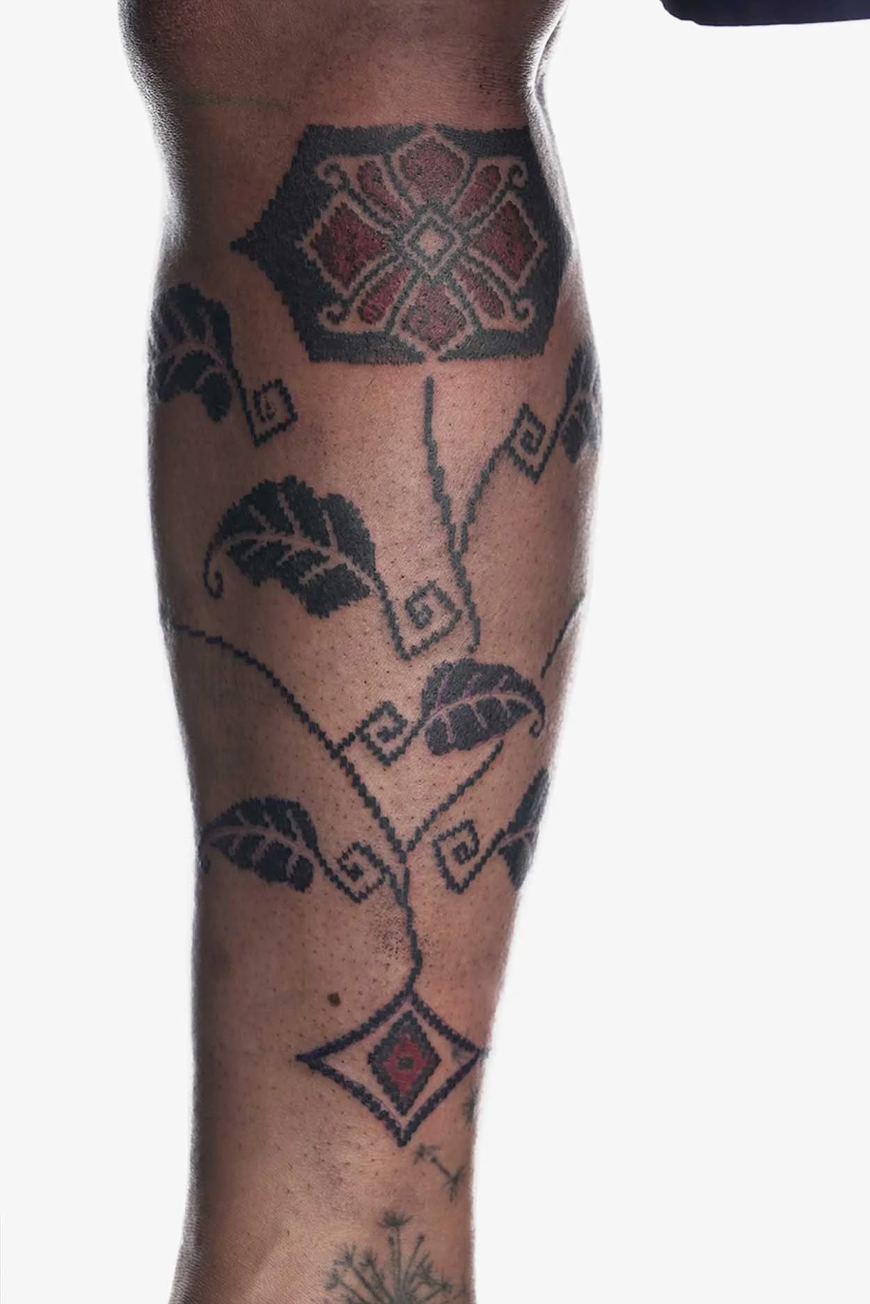 ornamental black work tattoo with batik pattern by sukanasikucing