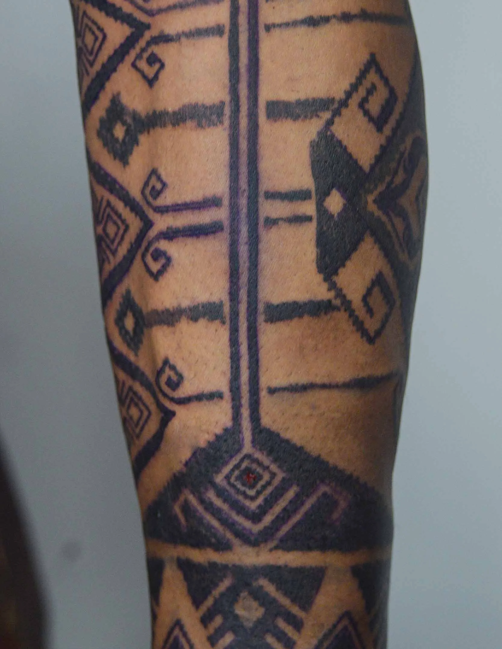 lower leg ornamental style ink in near kedungu tattoo studio