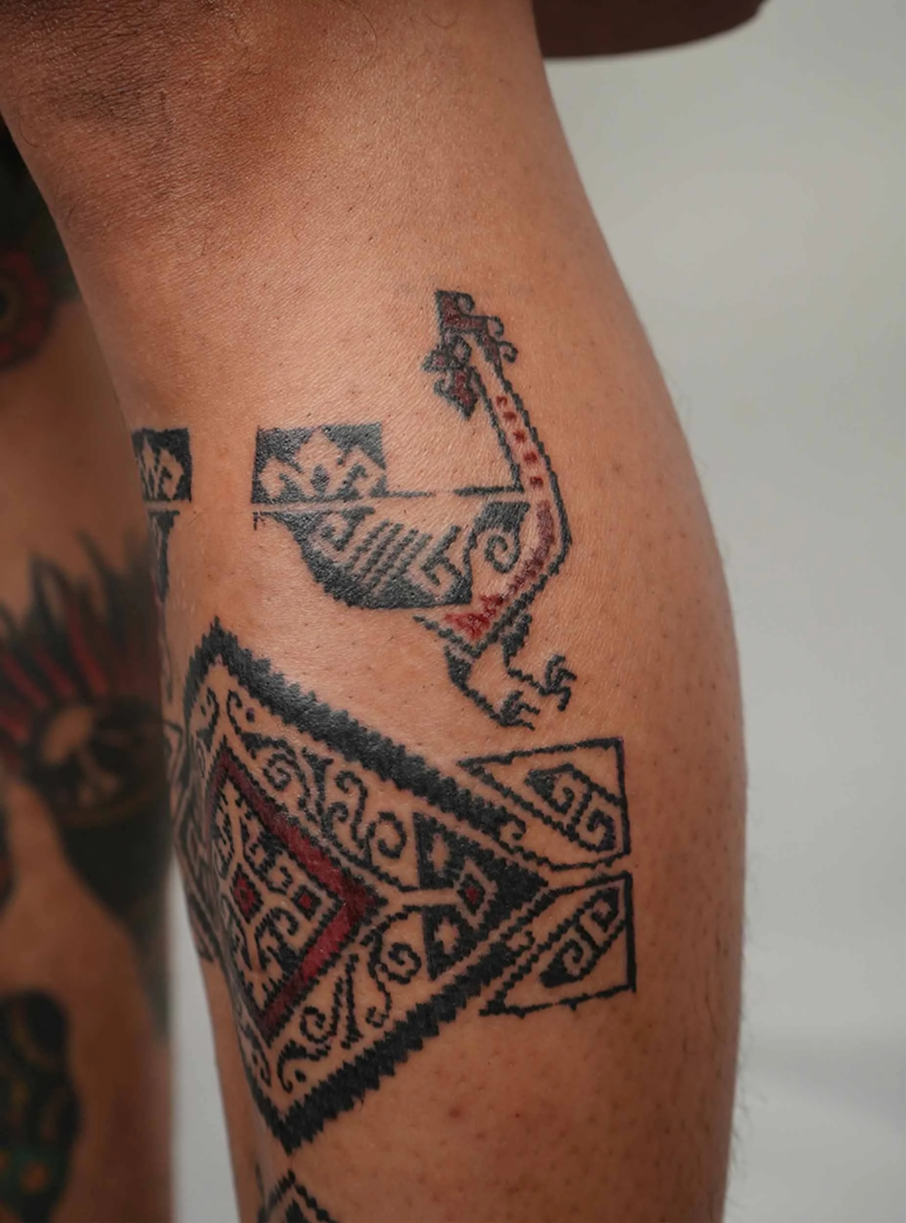 roaster tattoo in ornamental style mix with traditional Indonesia pattern in bali