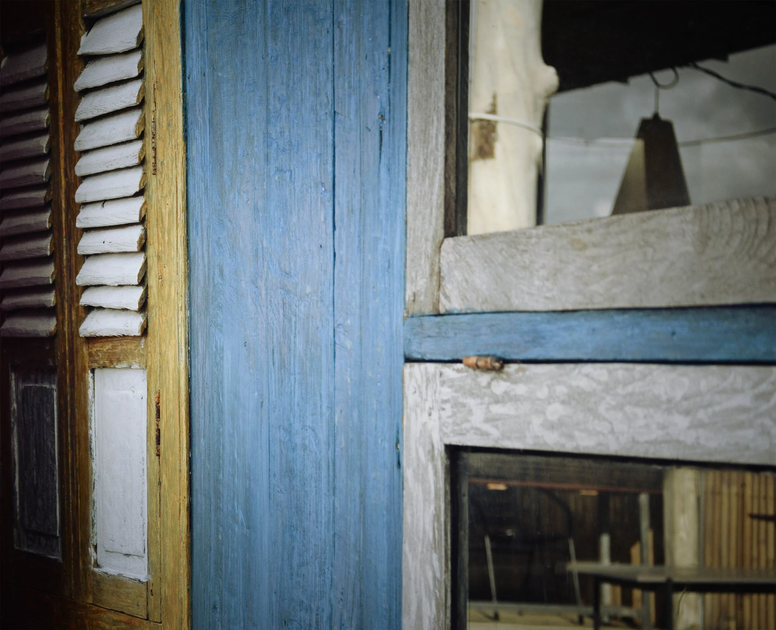 wooden and glass windows of Joglo House