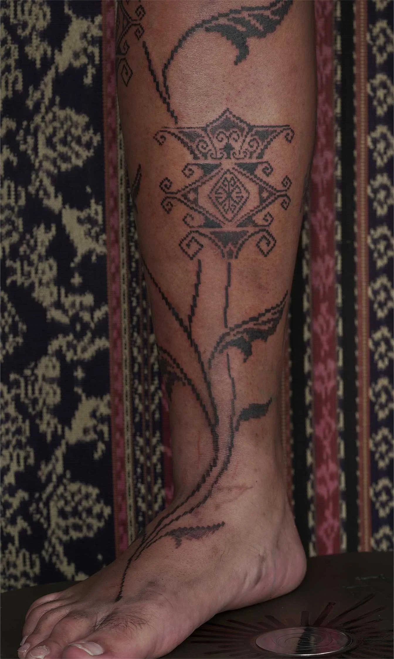 ornamental Tulip Tattoo in Bali with Tenun Texture Style by Sukanasikucing