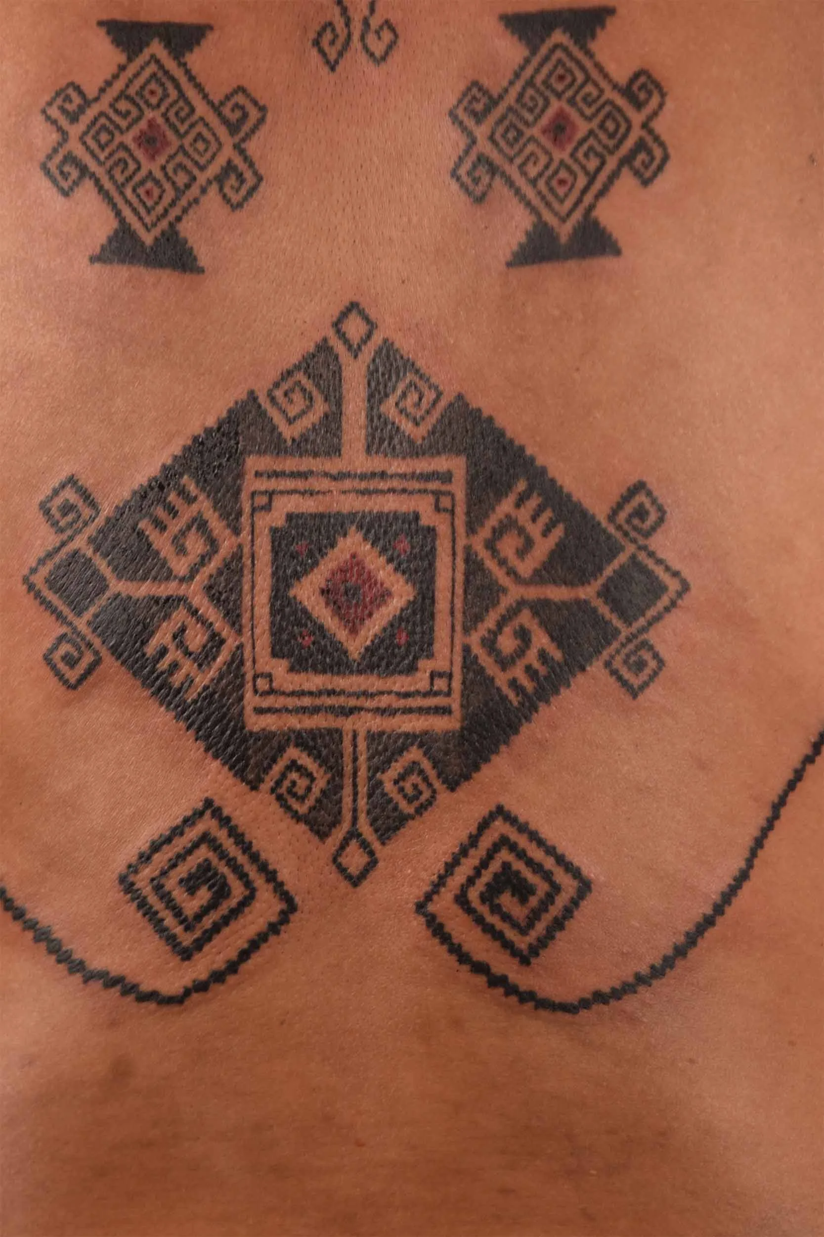 ornamental back piece tattoo design
