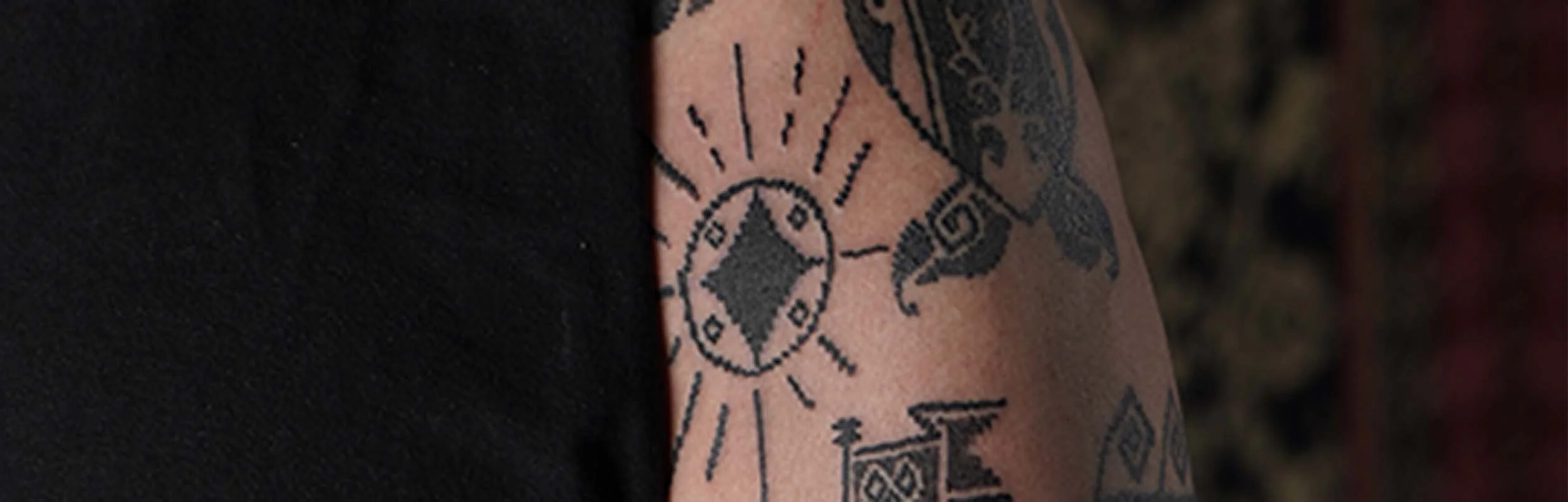 Sun Tattoo in ornamental style
