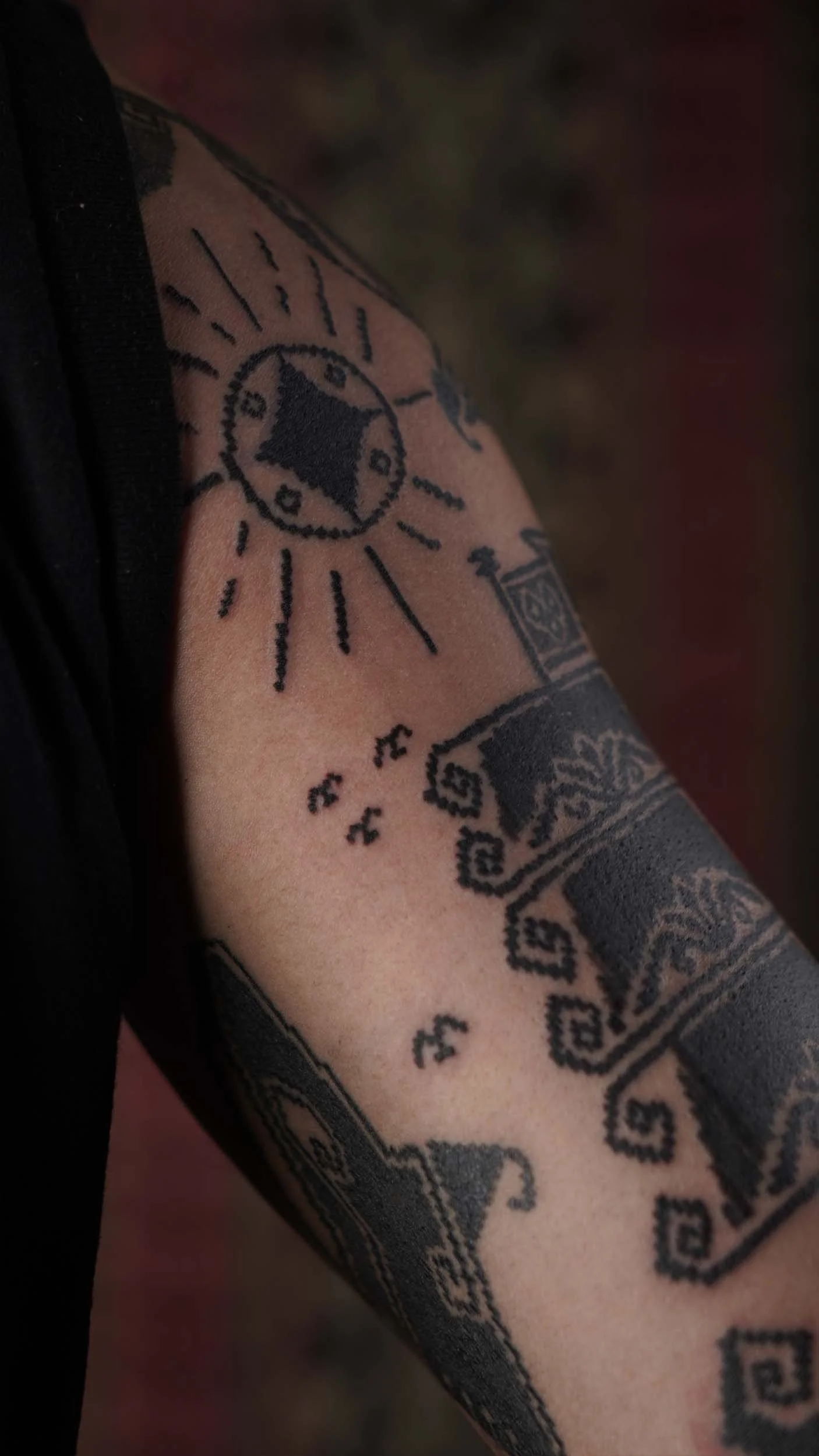 Ornamental ship tattoo idea on bicep