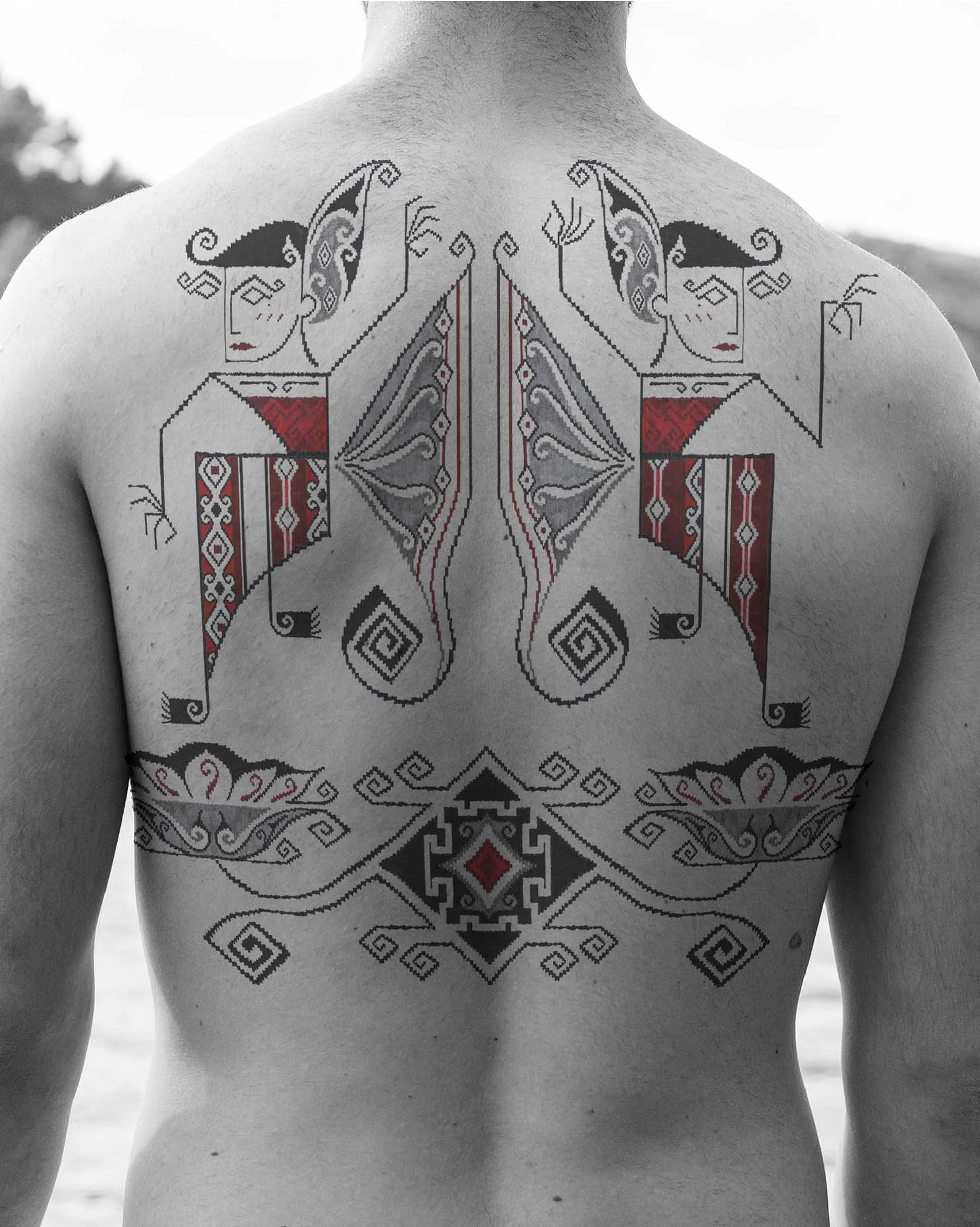 Bali dancer Ornamental tattoo with Lotus flower on back placement tattoo design