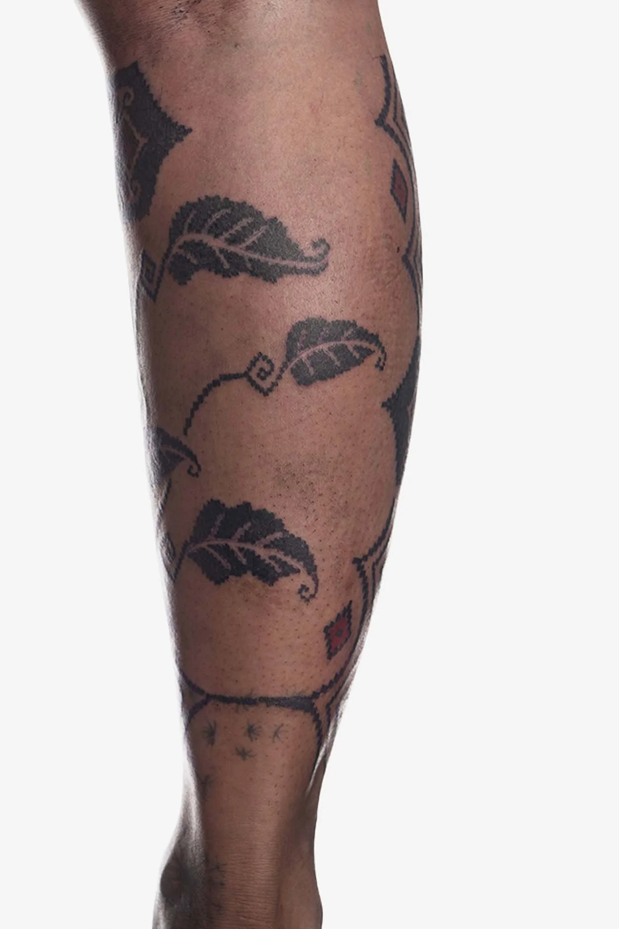 floral ornamental tattoo with tenun texture by suka nasi kucing bali based tattooer