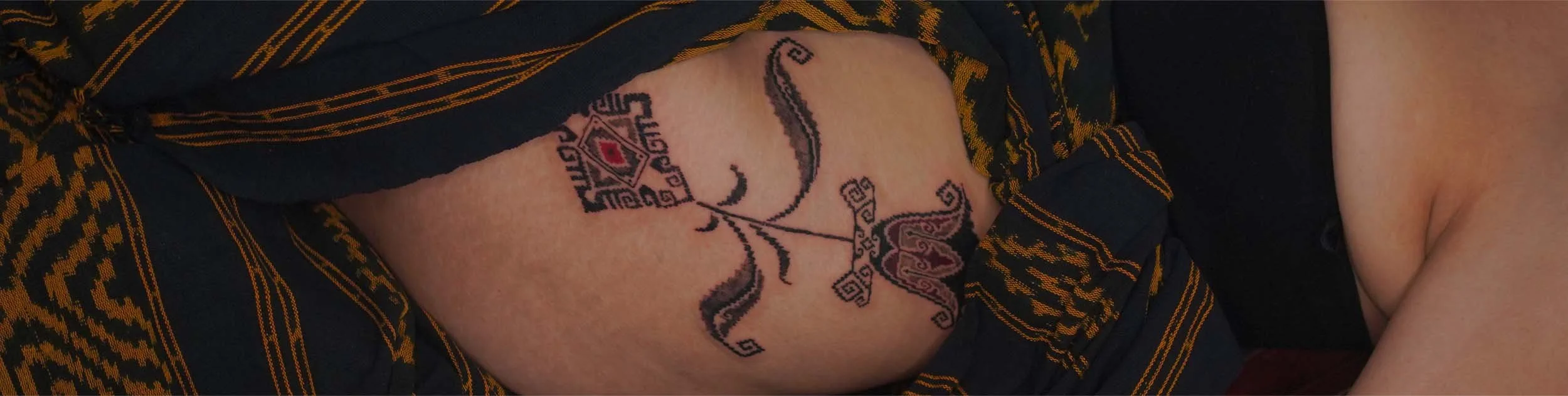 ornamental tulip thigh tattoo bali indonesia