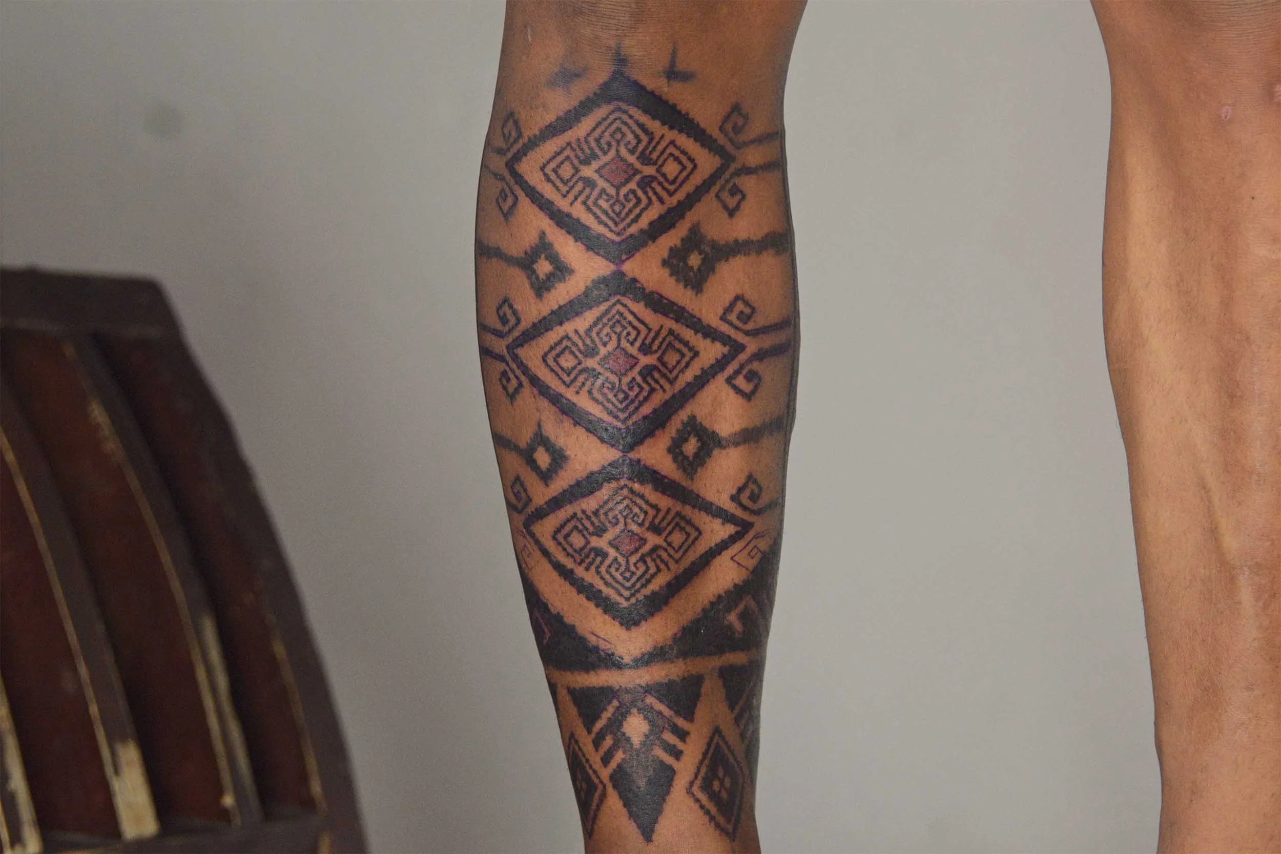ornament leg sleeve with ankle band ink with bold blocking style