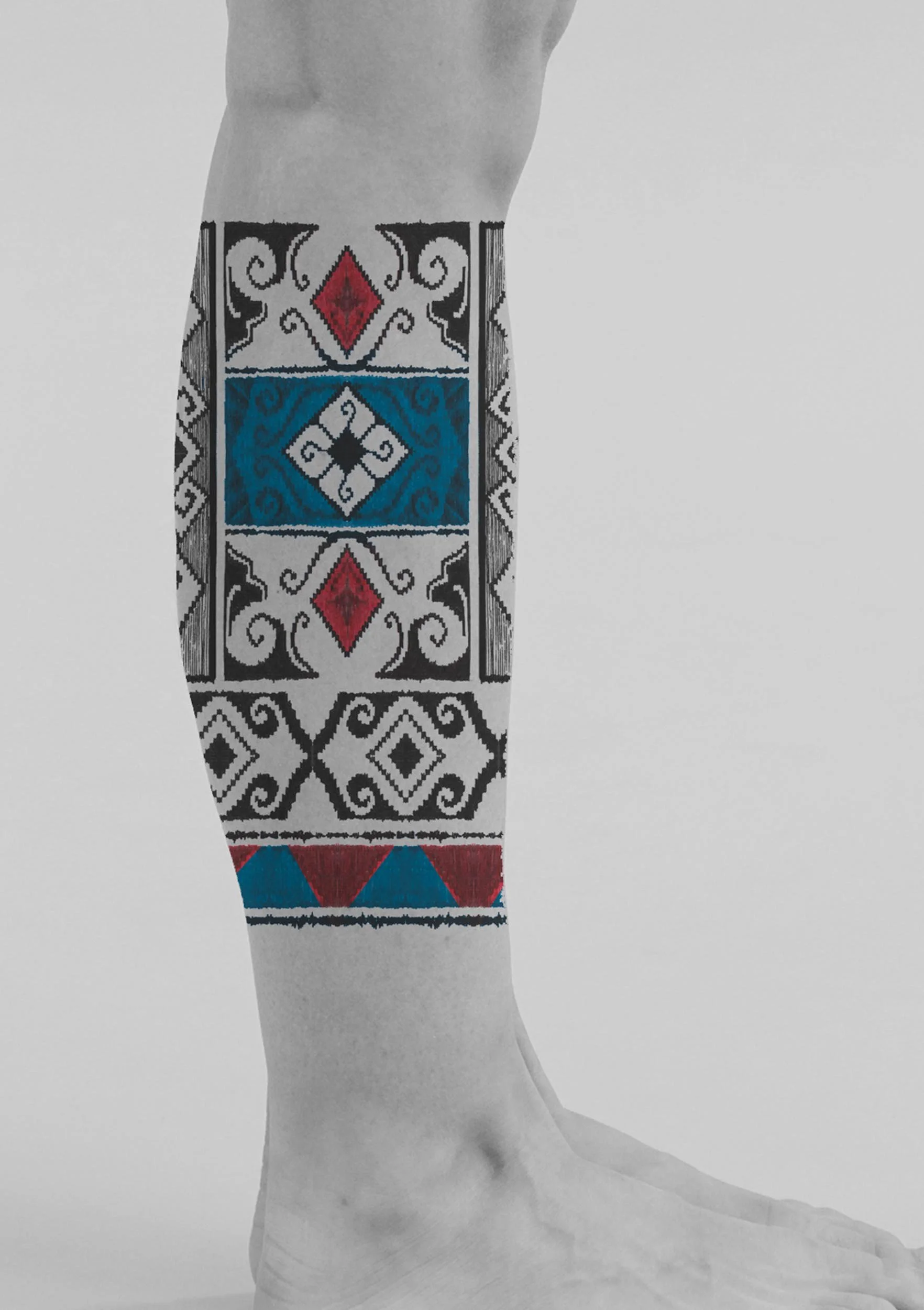 ankle sleeve tattoo in Bali ornamental style