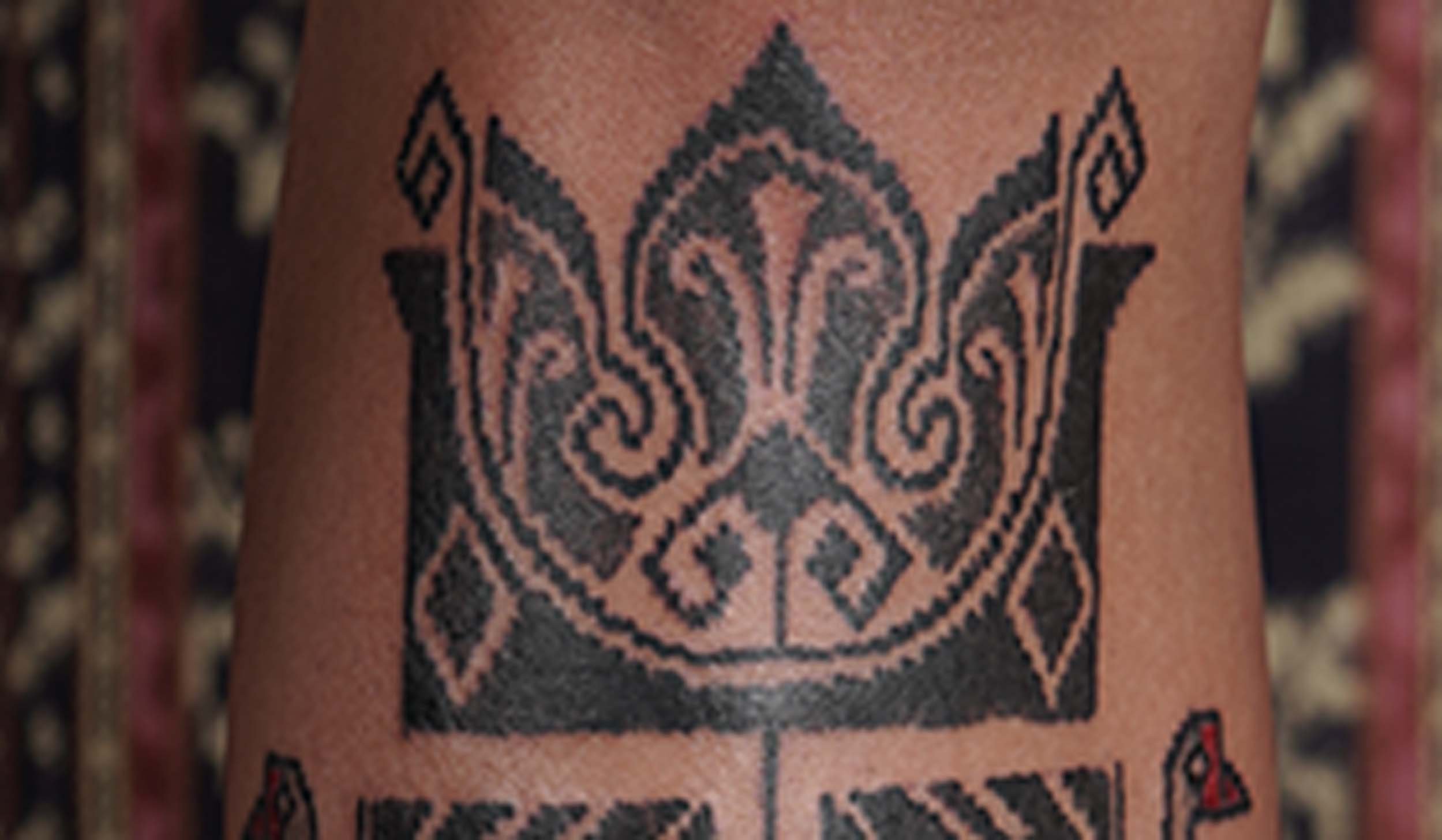 floral tattoo using ornament style black work on shin bone done in near canggu studio