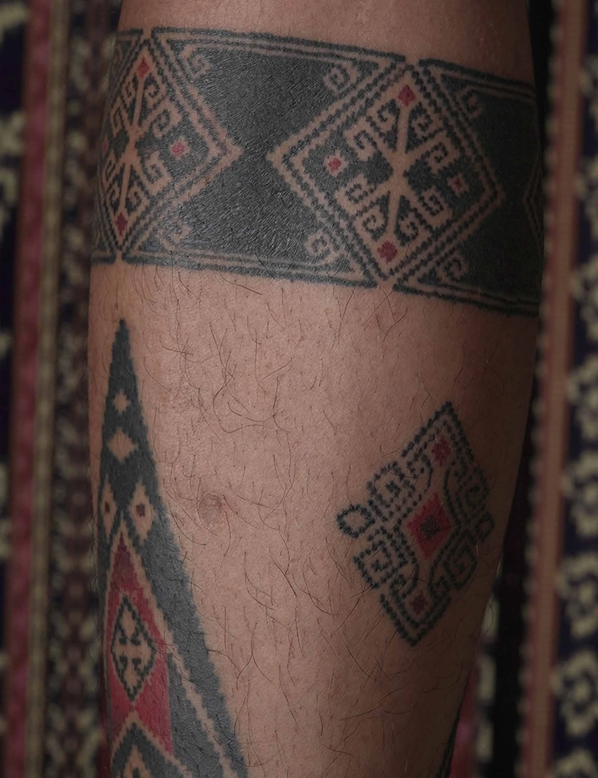 shin tattoo with leg band tattoo on ornamental style by bali based tattoo artist