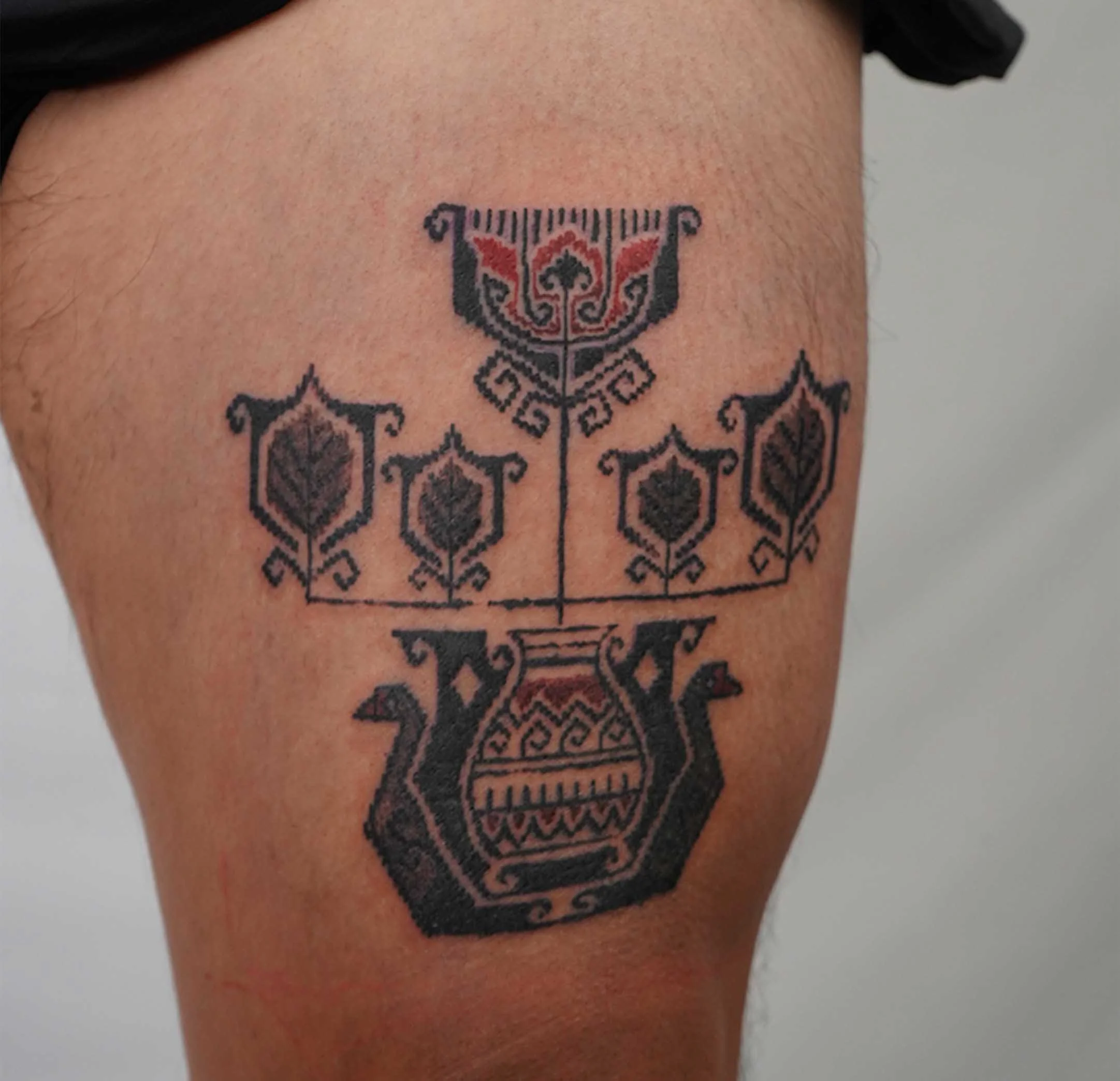 tulip in vase tattoo idea
