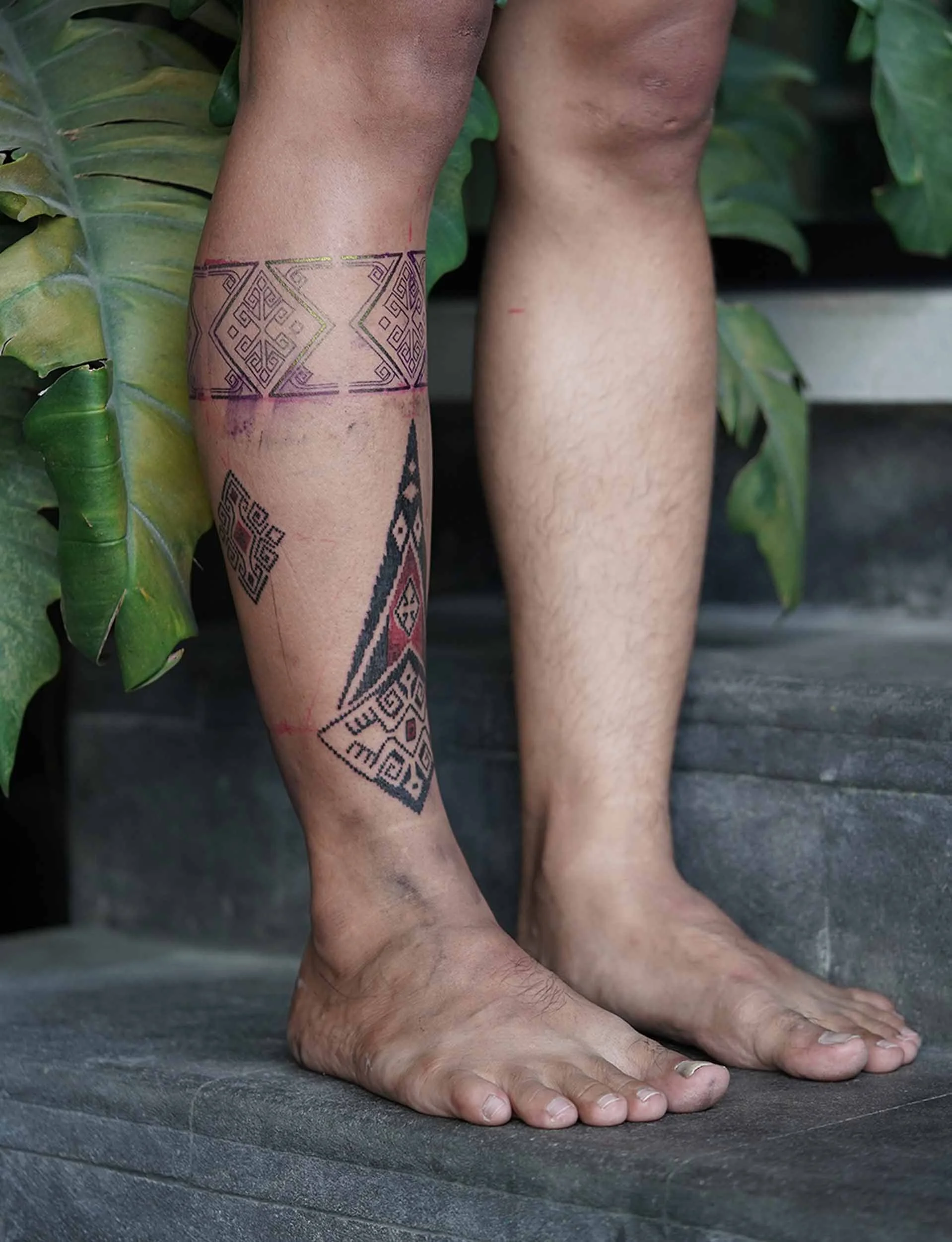ornament tattoo leg band and shin and calf placement
