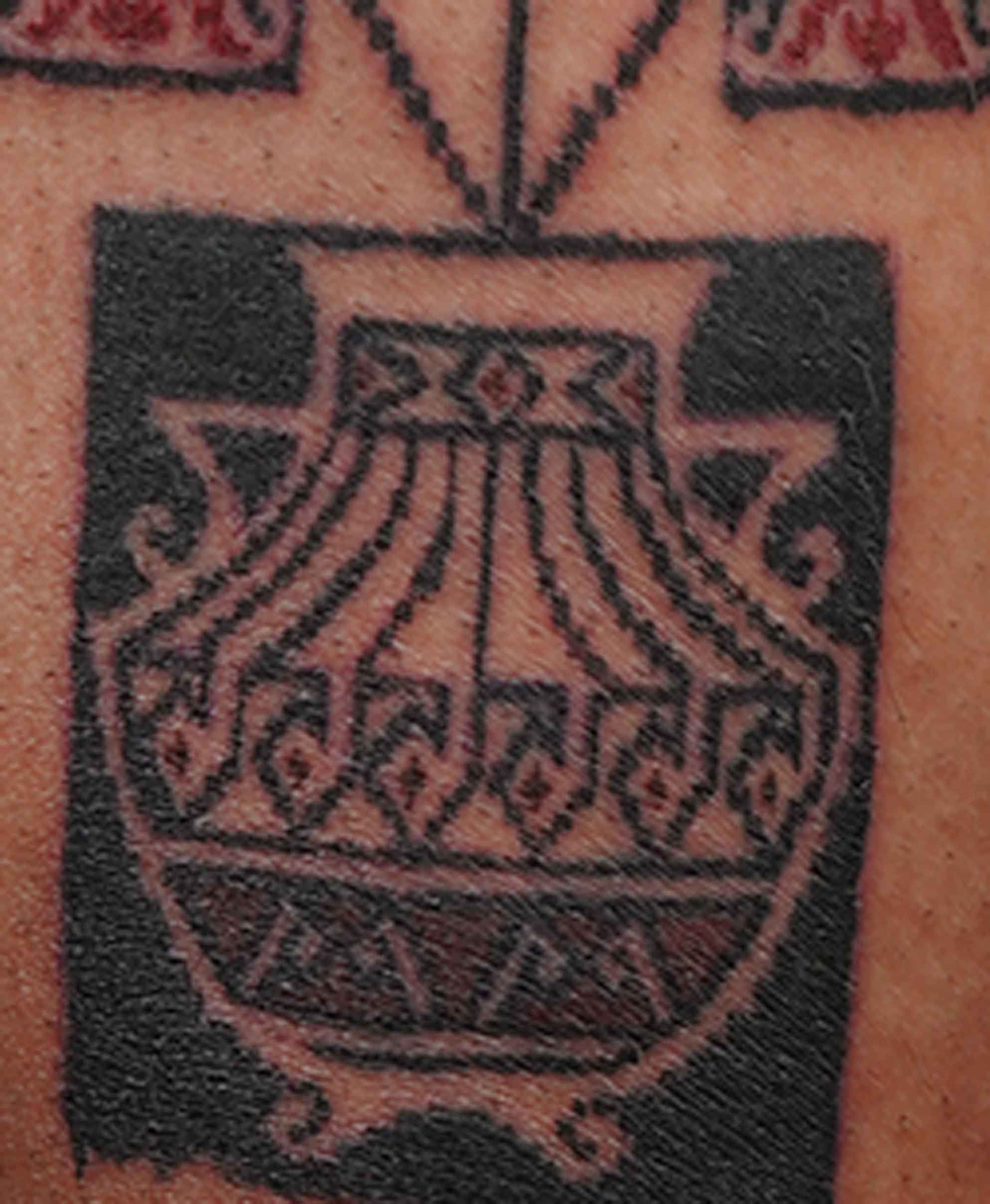 vase tattoo using ornamental style