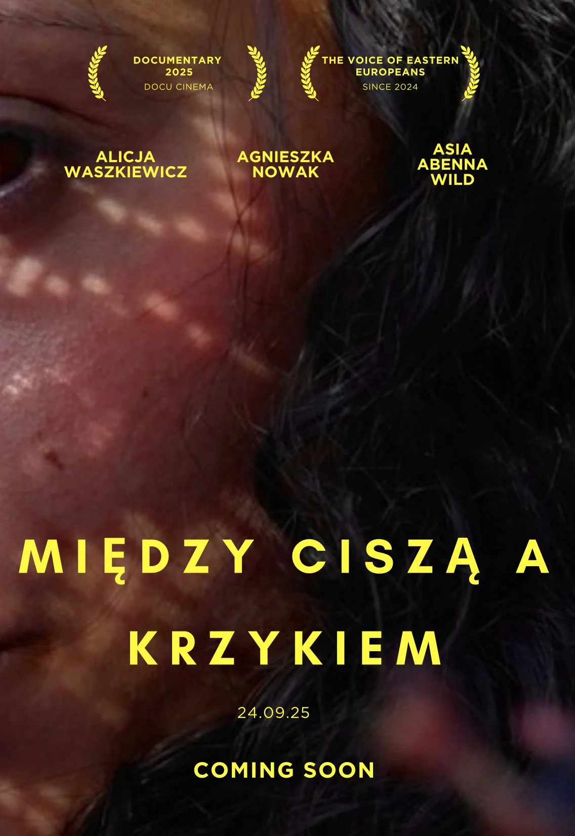 Promotional poster for a film or documentary with reviews, a close-up of a person's face, and text in Polish and English, including the title "Między ciszą a krzykiem" and release date "24.09.25," with a "Coming Soon" message.
