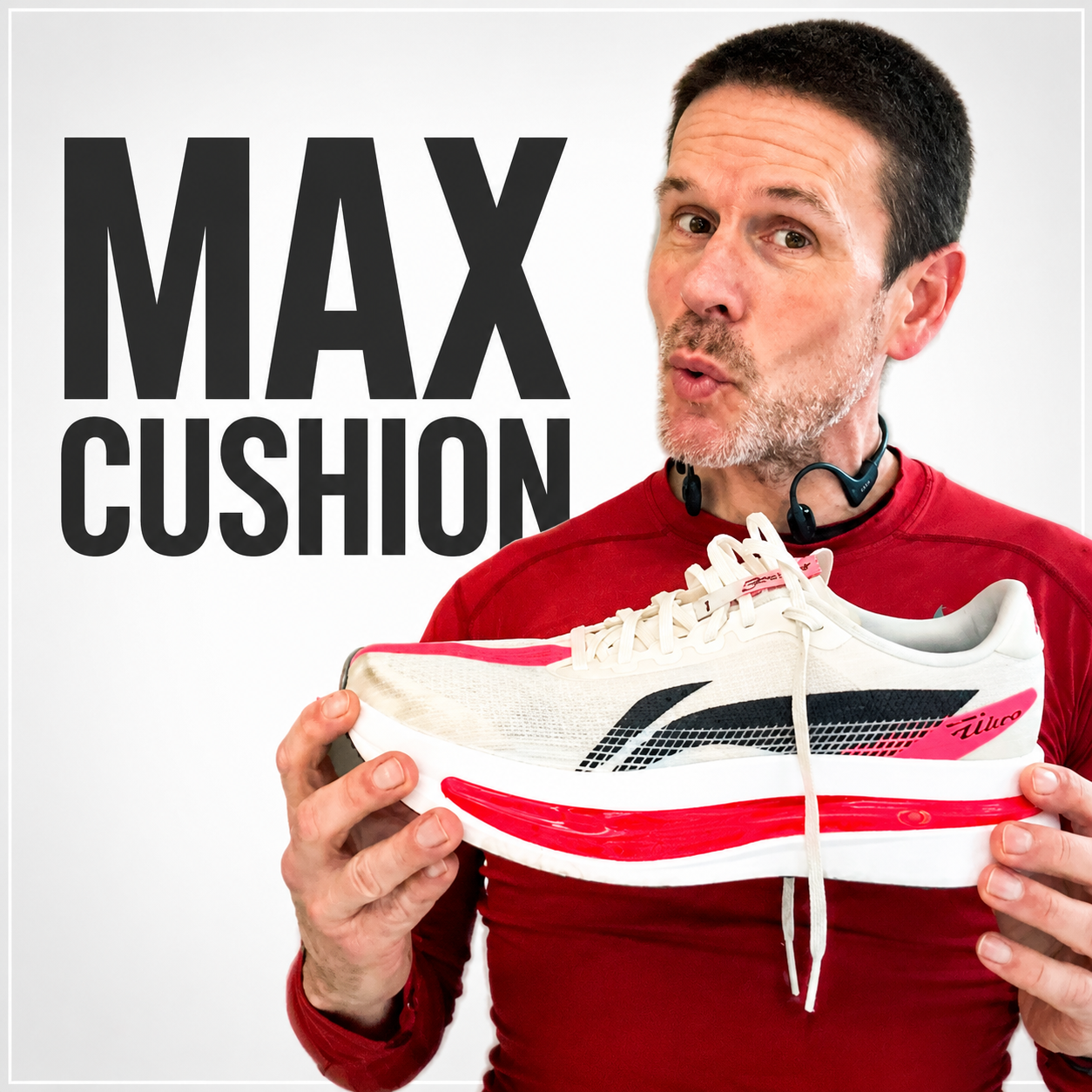 A man holding a running shoe with the text 'Max Cushion' in the background