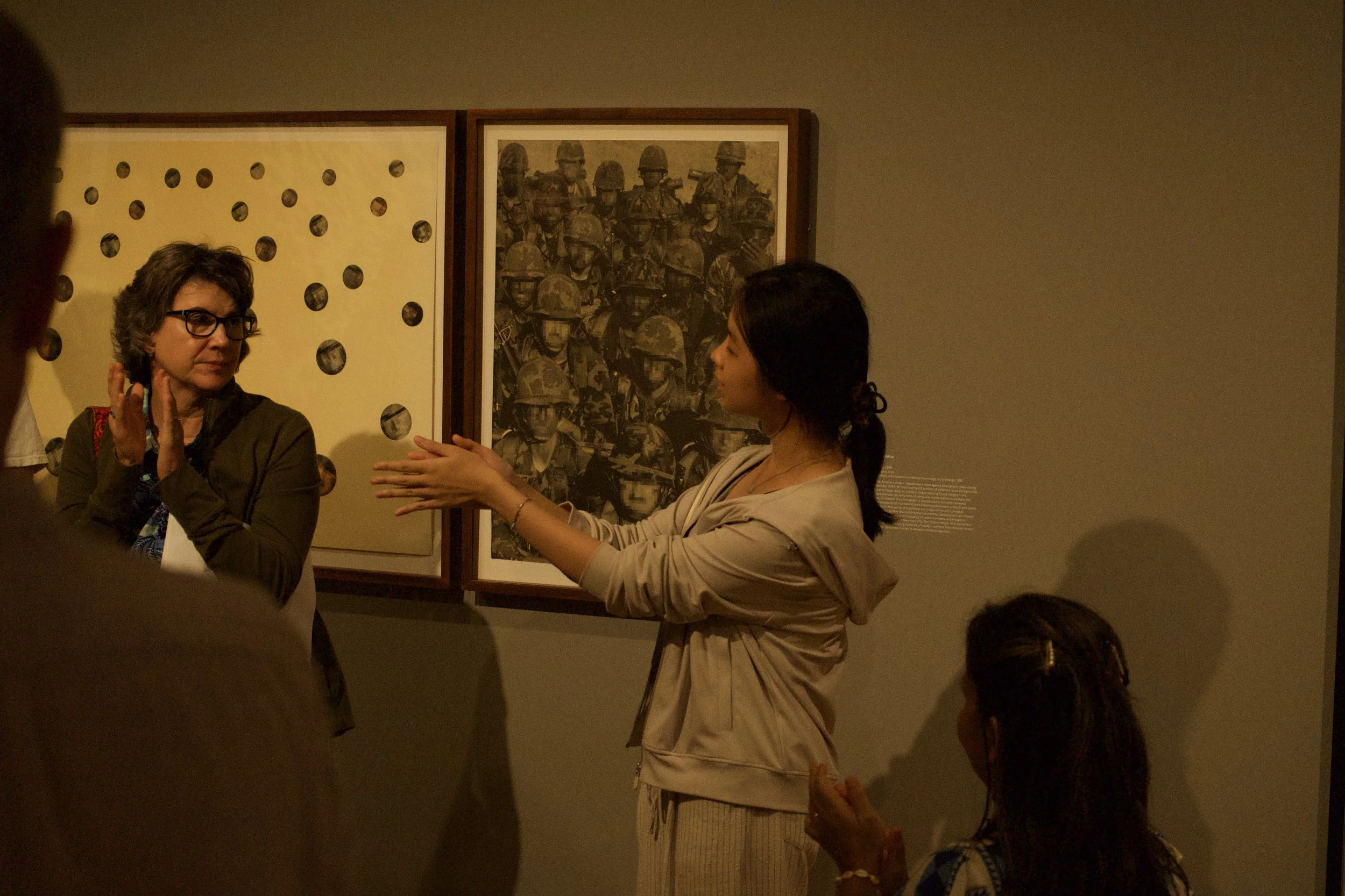 Composer Haibei Chen introducing her piece Cowboys and Indians in the galleries of the Mildred Lane Kemper Art Museum. Photo by Yeonsuk Jung.