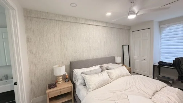 Subtle textured wallcovering installed in a bedroom