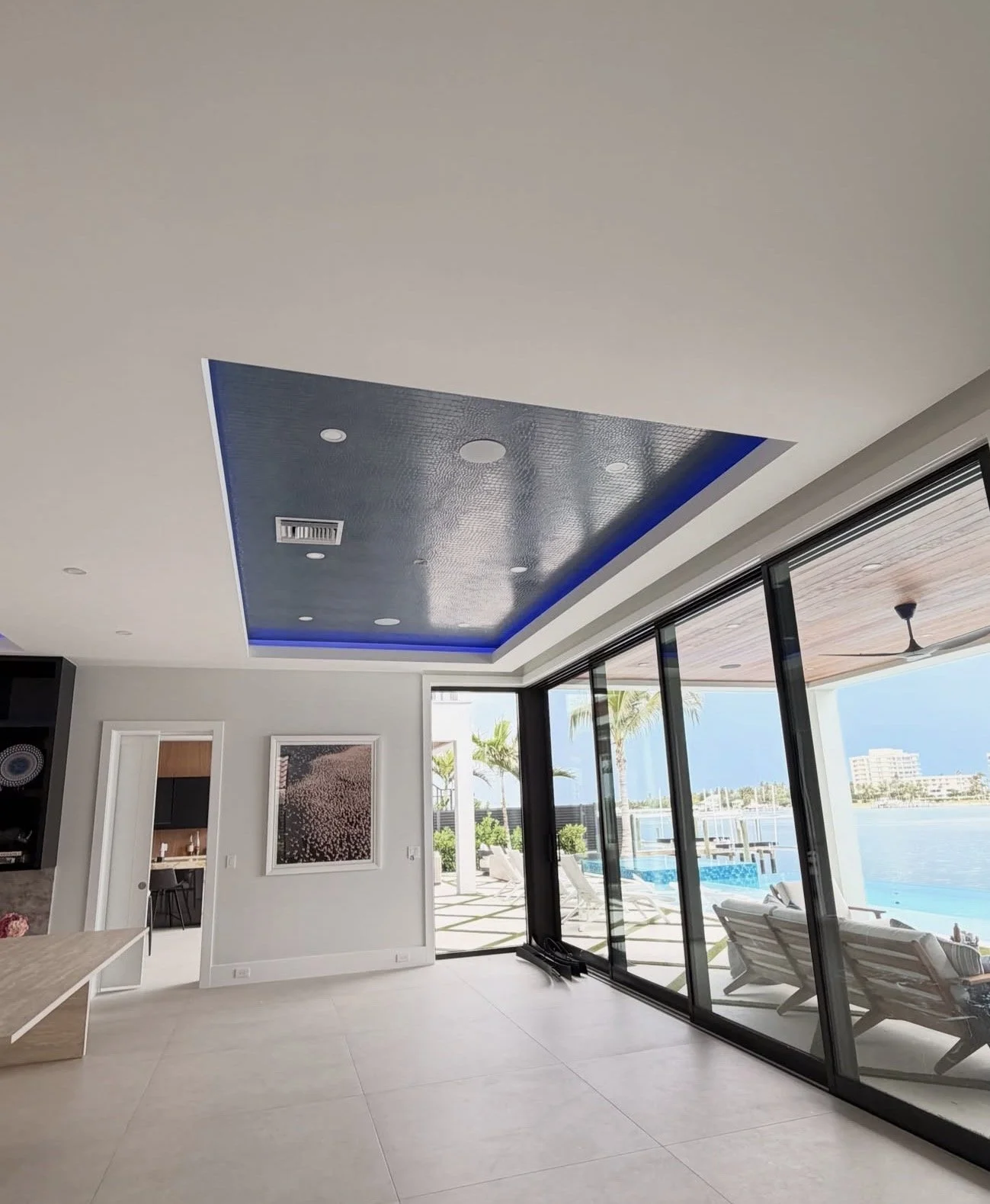Luxury ceiling wallcovering installation in a waterfront residence