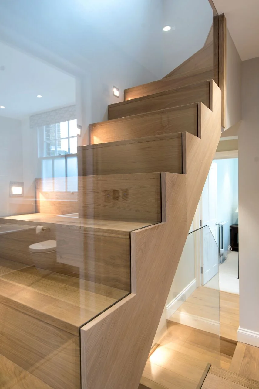 barnes-design-house-refurbishment-elsley-road-custom-glass-staircase.jpg