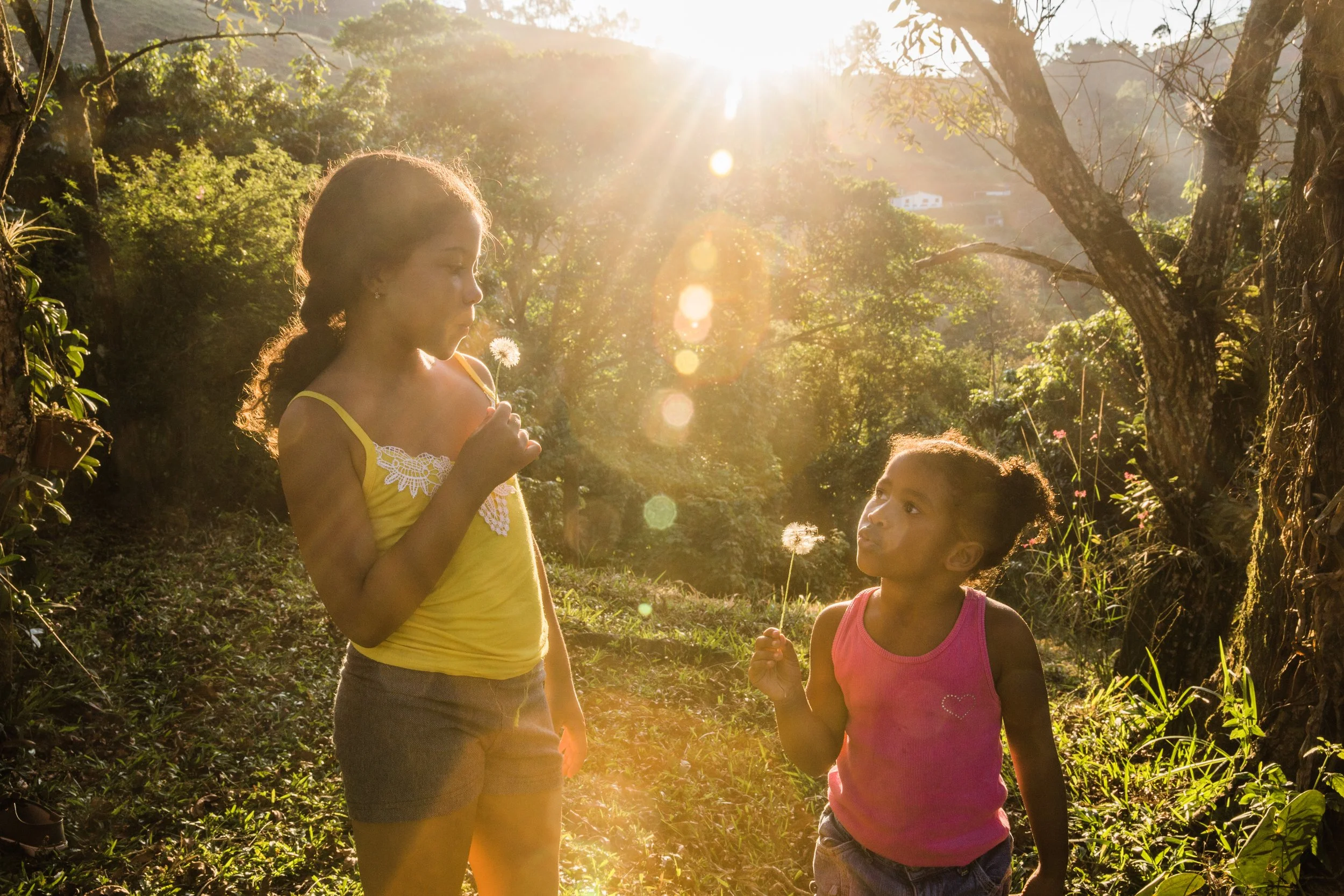 Speech therapist working with a children outside during an in-home session