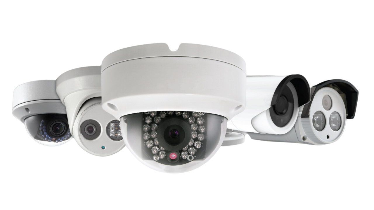 A row of six white security cameras with black and gray lenses, arranged in a line.