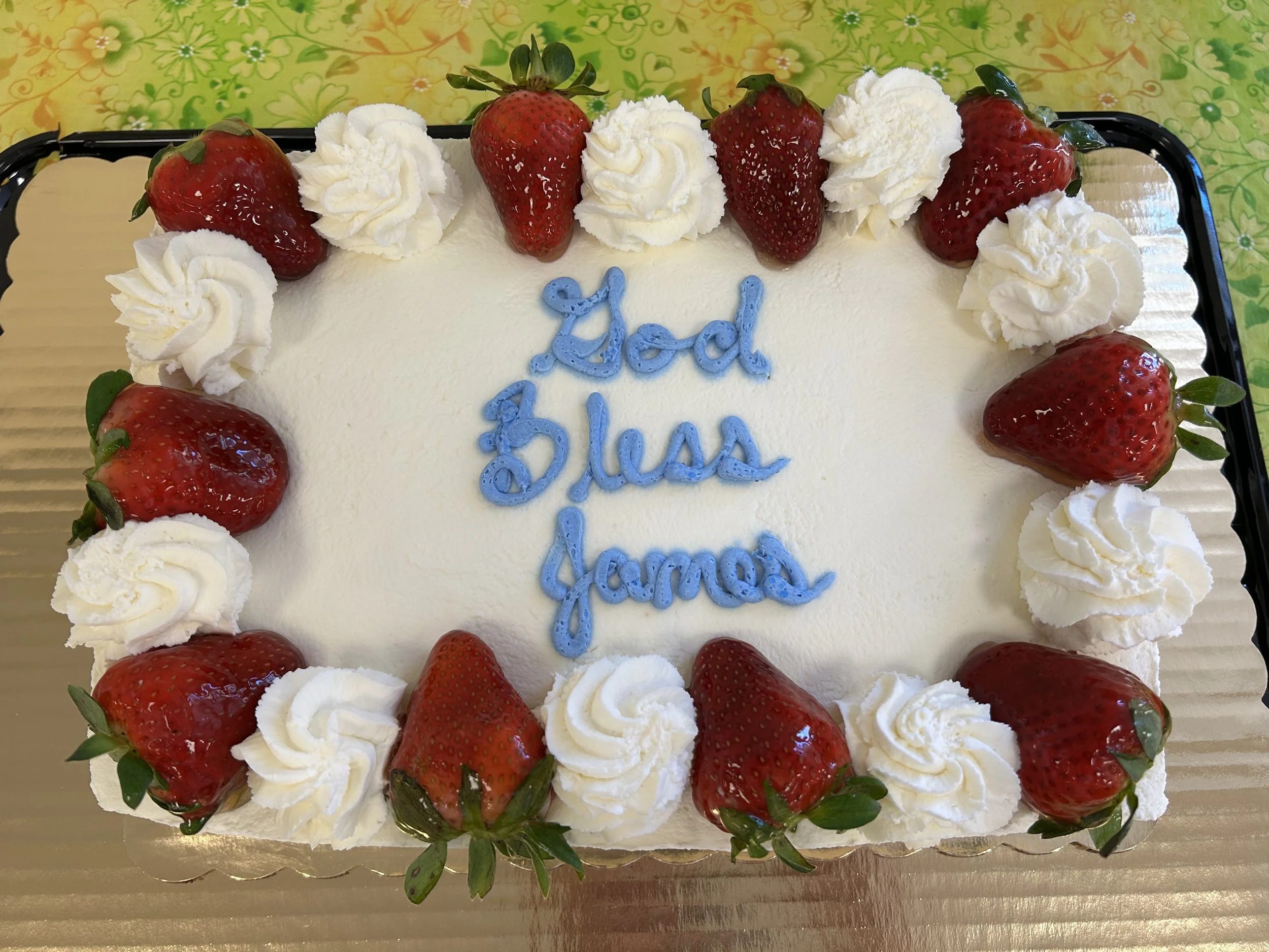 A decorated cake celebrating the 100th birthday of a church member.