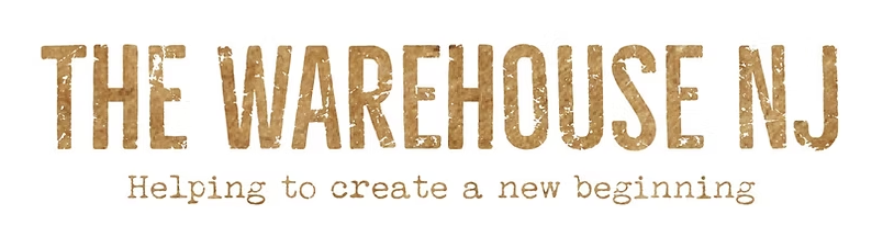 Text reading 'The Warehouse NJ' with a tagline 'Helping to create a new beginning' on a white background