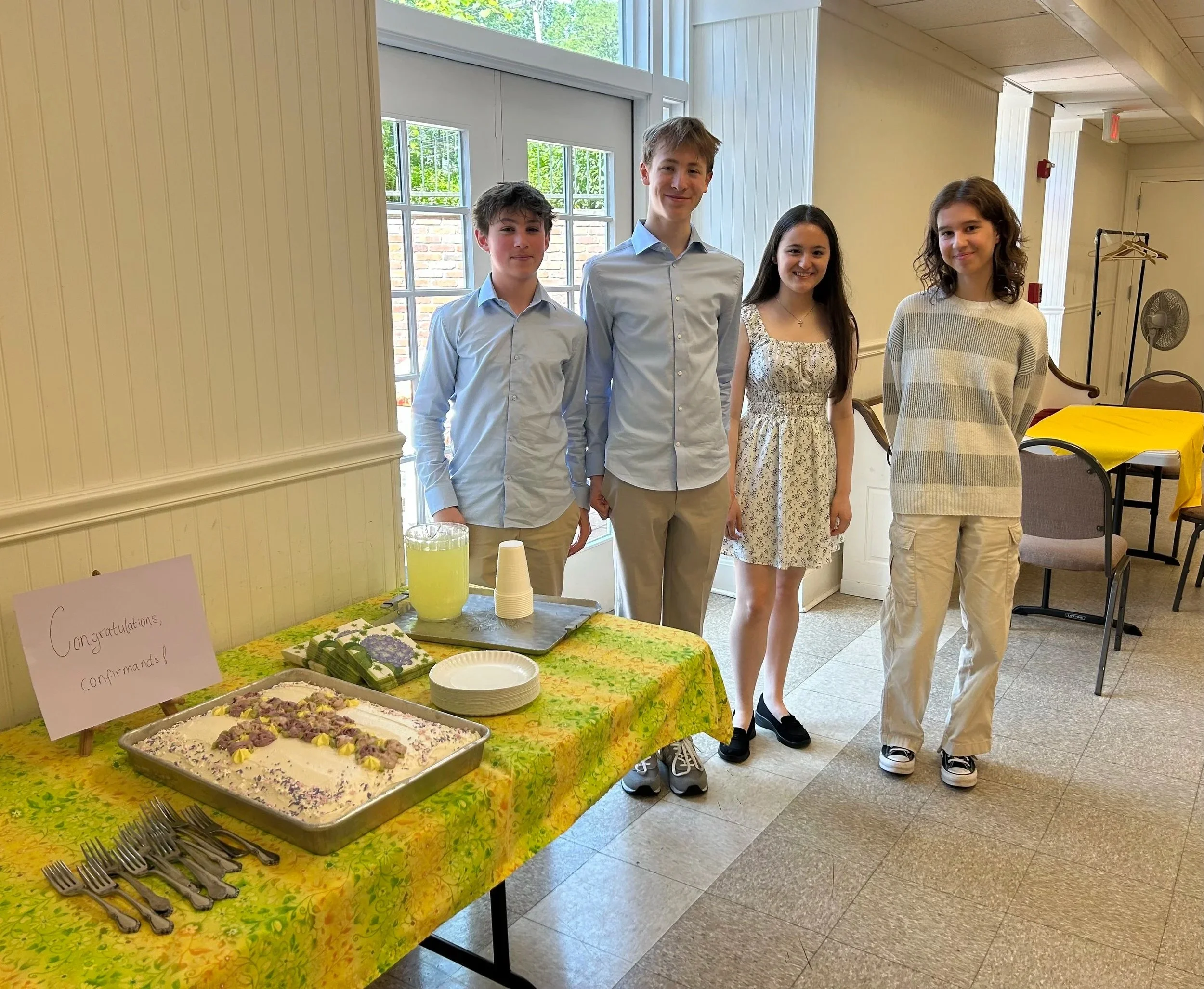 Four young people celebrating their confirmation into Wyoming Church