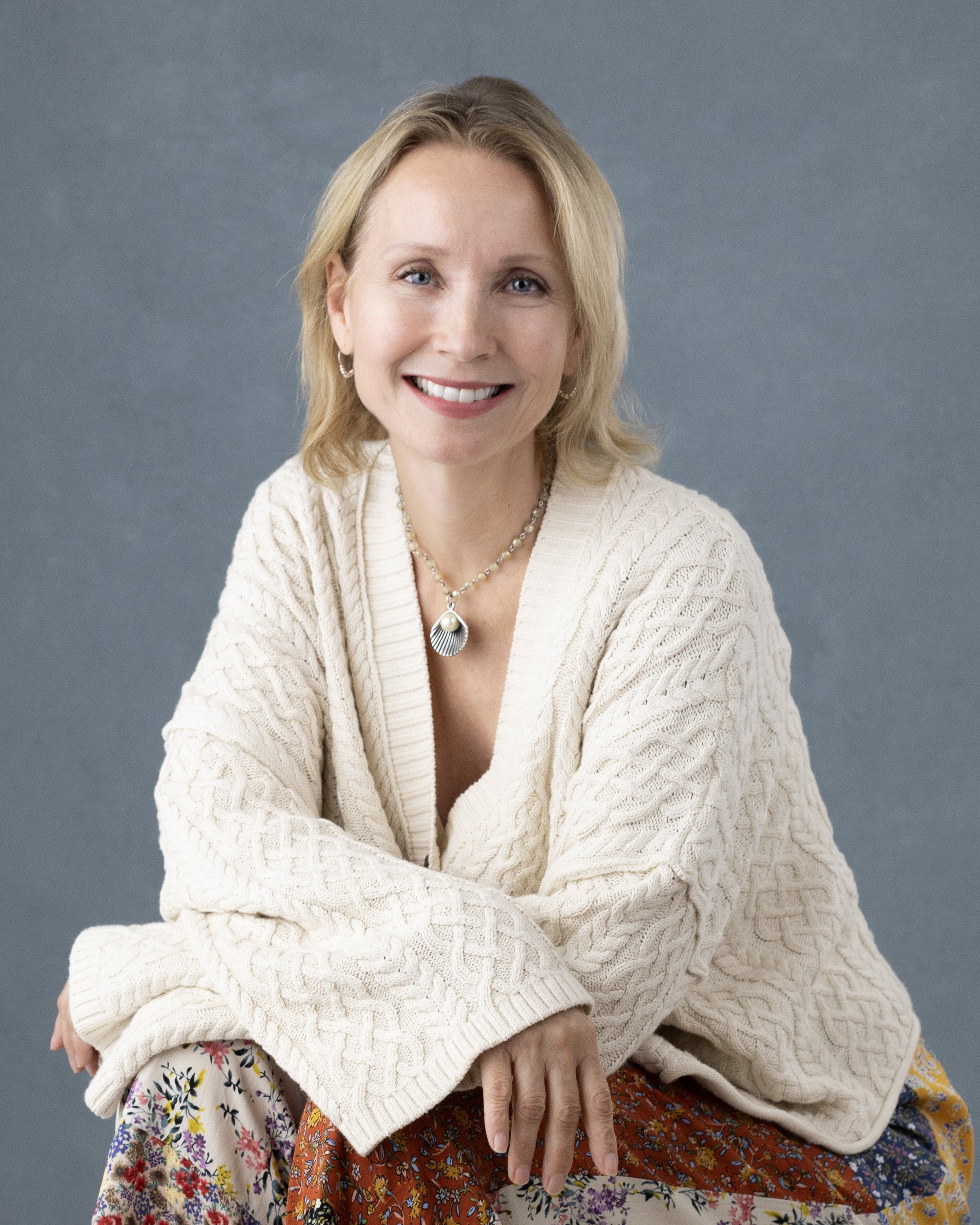 Juliet, professional photographer and owner of Photo Jane Studios, with 20 years of experience creating custom-tailored portrait experiences in Harford and Baltimore Counties.