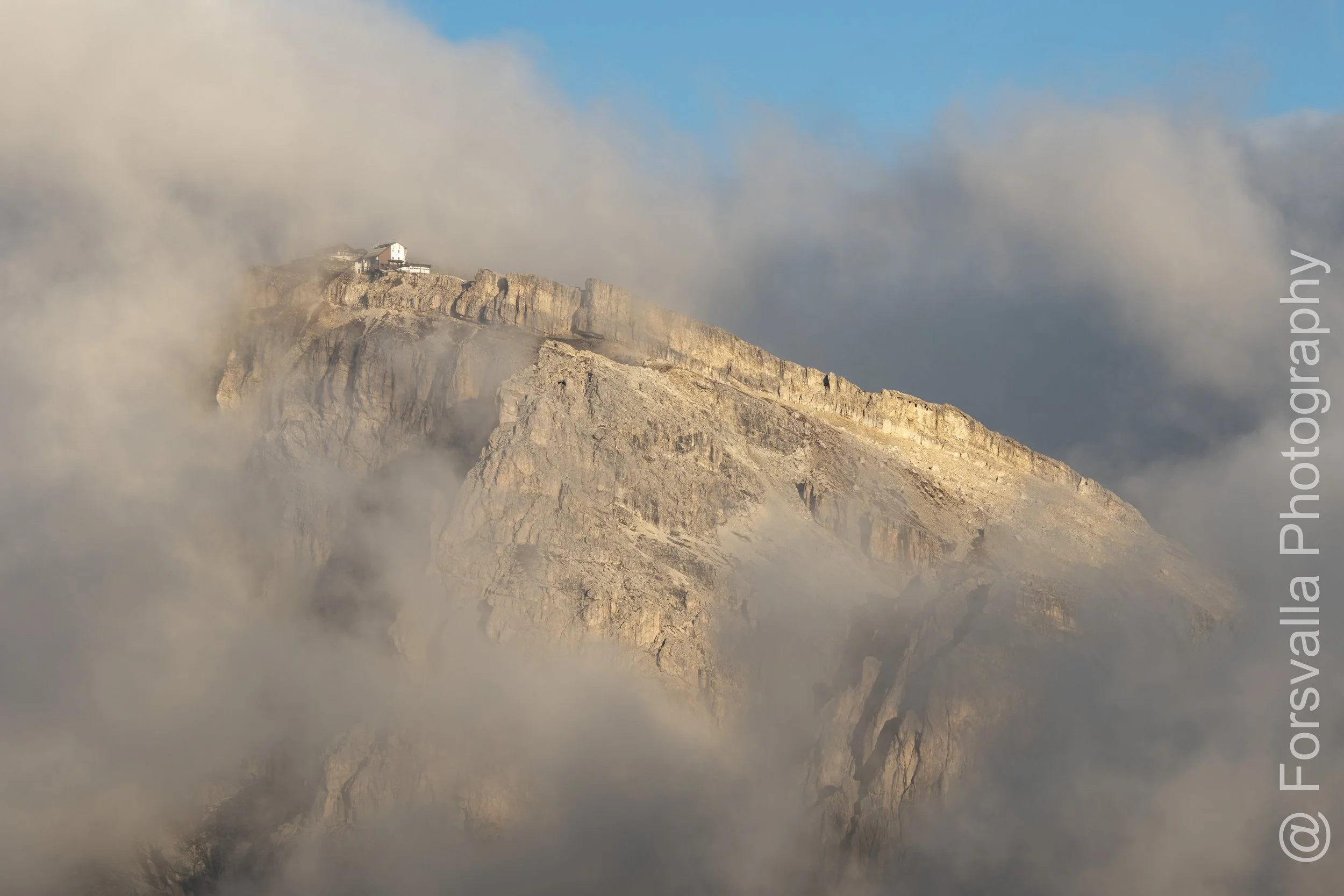 Dolomites - Mountain hut in the clouds