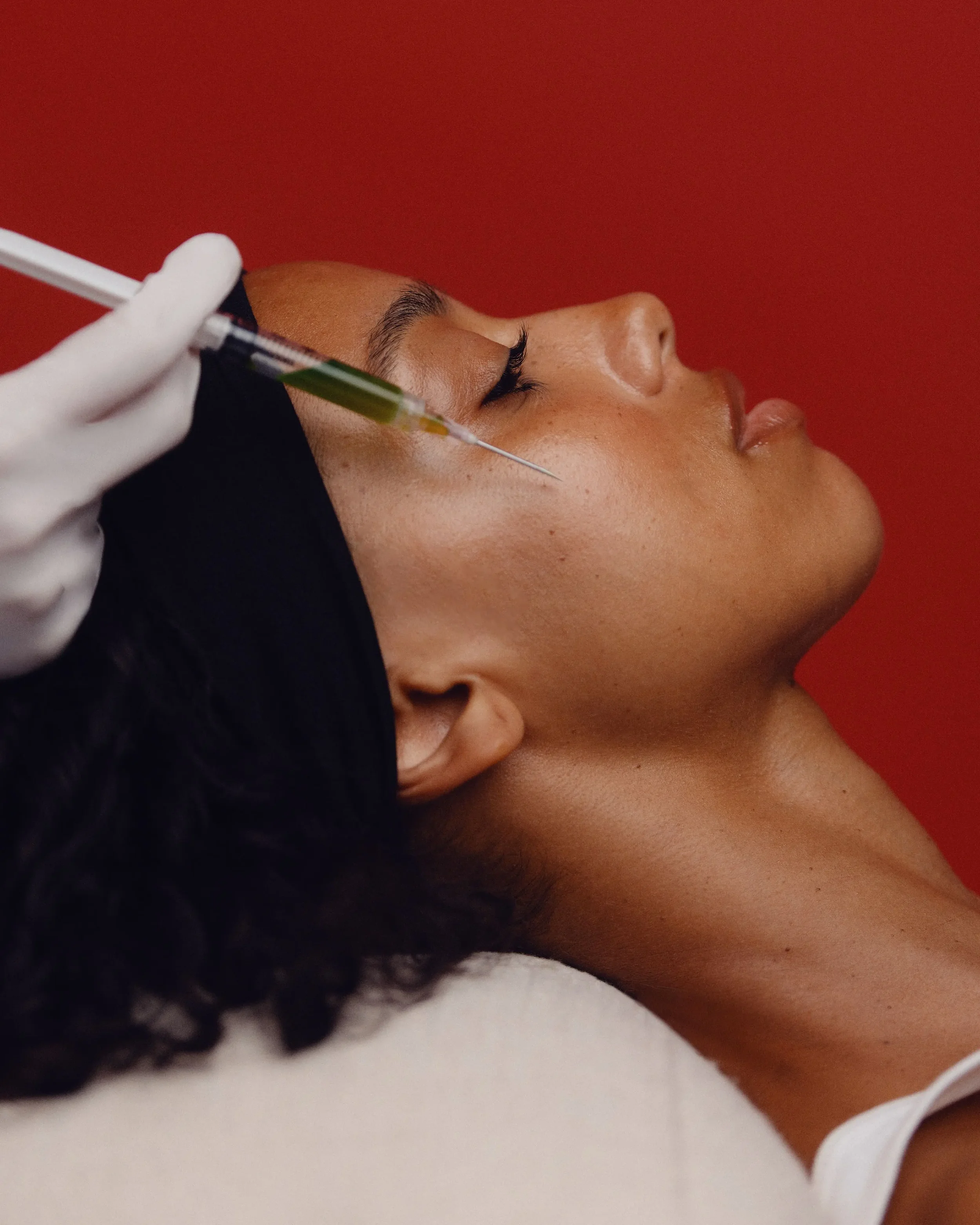 Client receiving aesthetic treatment