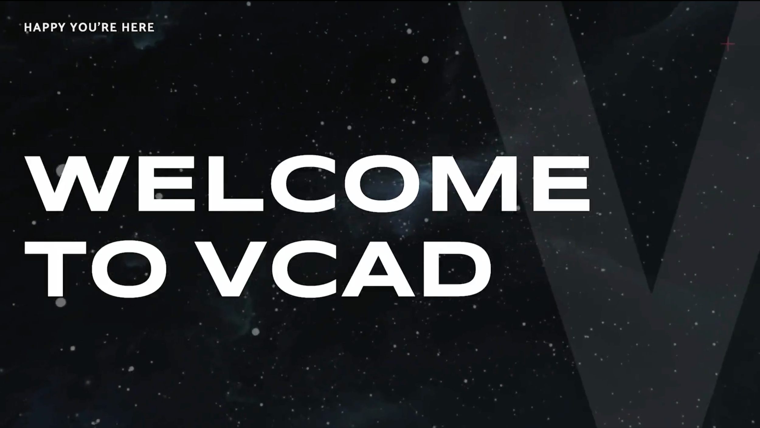 A welcome slide with a space background featuring stars and a galaxy, containing the text 'Happy You're Here' and large bold text 'Welcome to VCAD'.