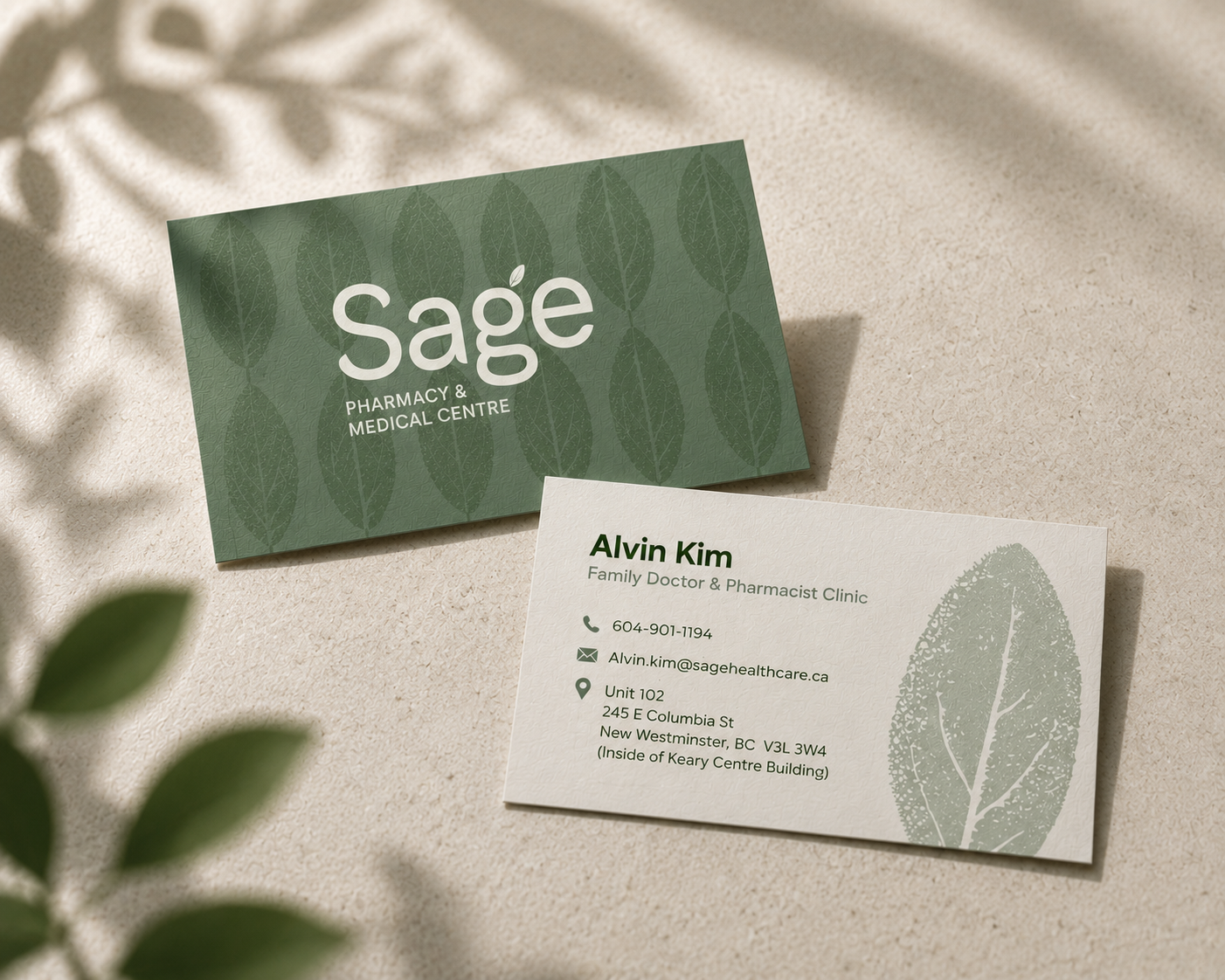 Business card for Sage Pharmacy & Medical Center with a leaf pattern background, and another card with contact information for Alvin Kim, a family doctor and pharmacist.