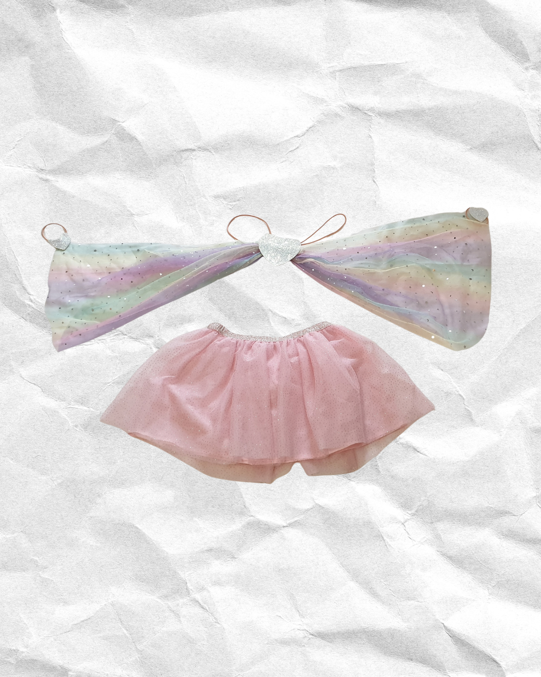 Arm wings and pink tutu 🧚.png