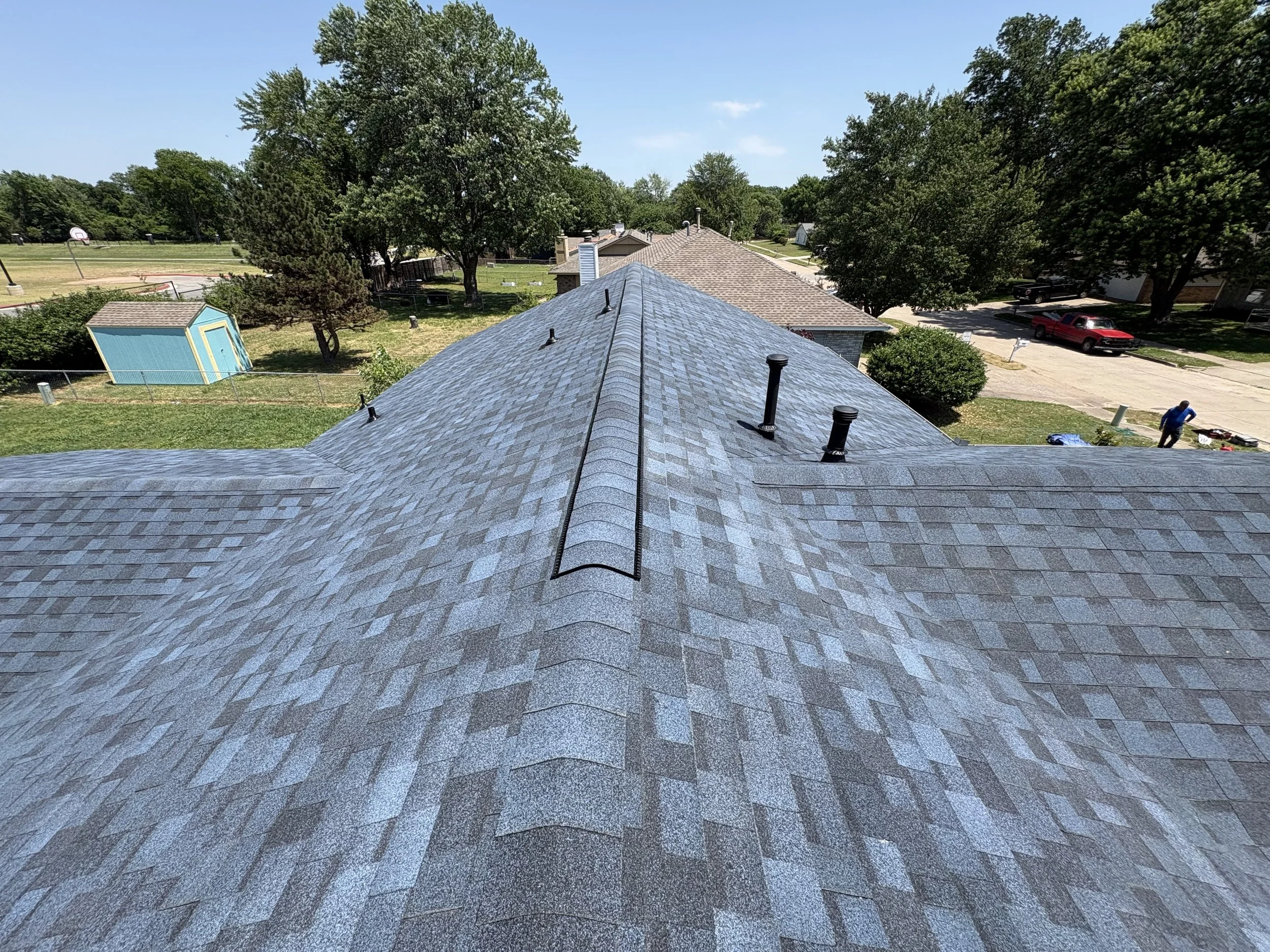 Roof view of Atlantic Blue IKO shingles on a residential roof replacement in Tulsa/Broken Arrow Oklahoma.