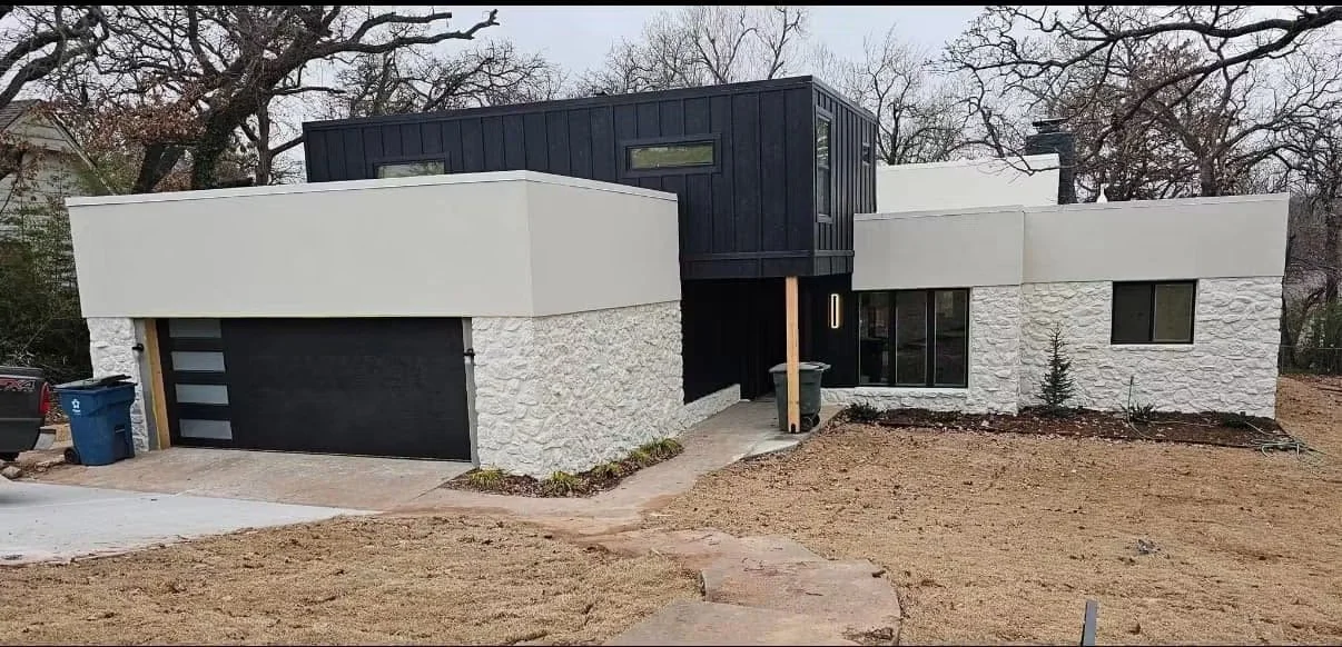 A roof that was wood shake, with the exterior being completely remodeled and looking amazing.