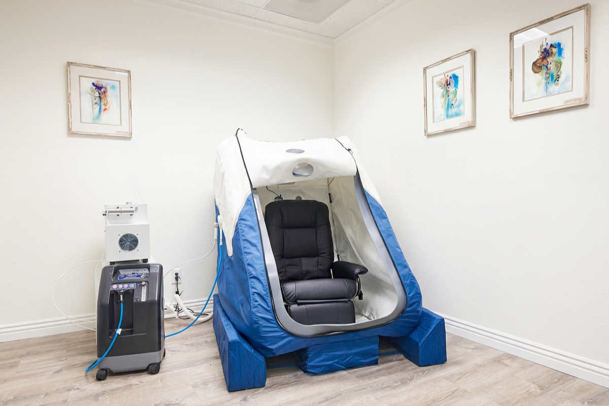 Soft hyperbaric oxygen chamber in a private treatment room at SoRay Studio in San Jose.