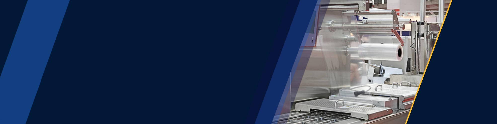 Industrial manufacturing equipment with rolled plastic or aluminum on a production line.