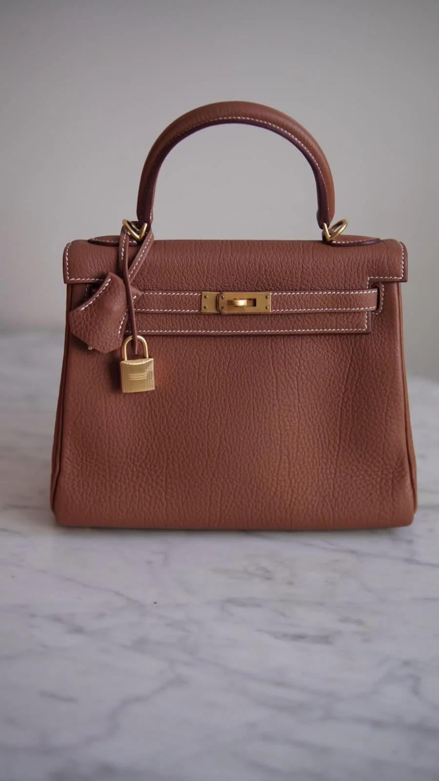 Bolsa Hermès Kelly 25 Togo Gold