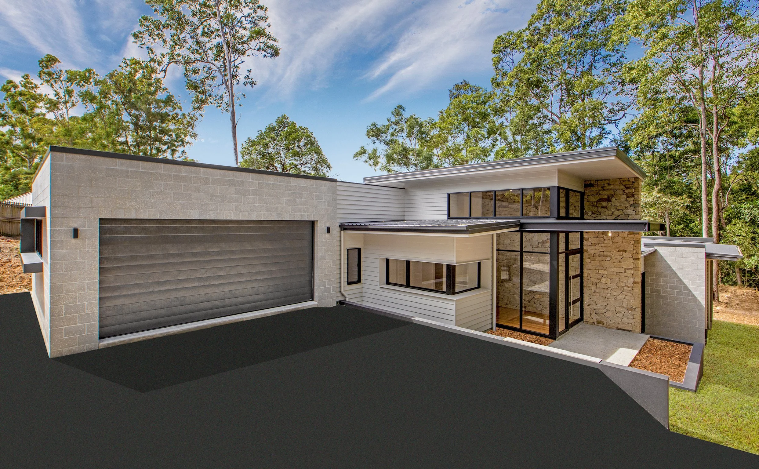 Modern two-story house with a flat roof, large glass windows, and a garage, surrounded by trees under a partly cloudy sky.